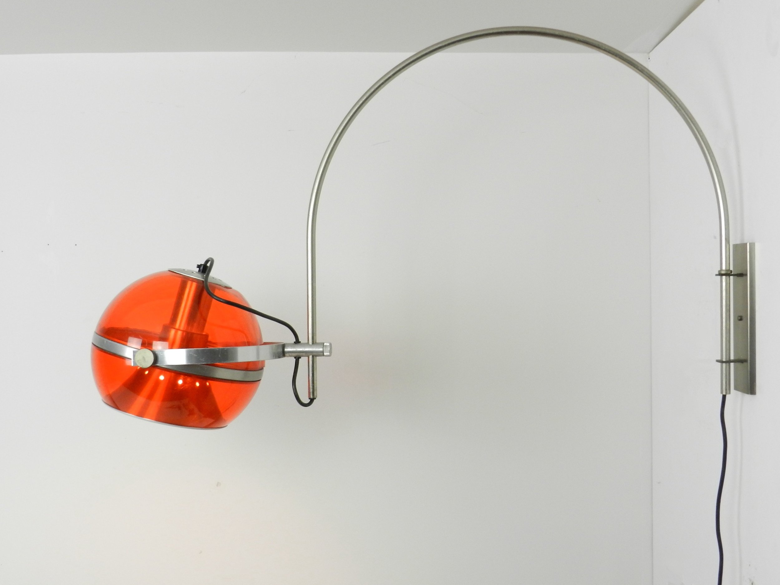 Space age arc wall lamp by Dijkstra.  Netherlands, 1970s