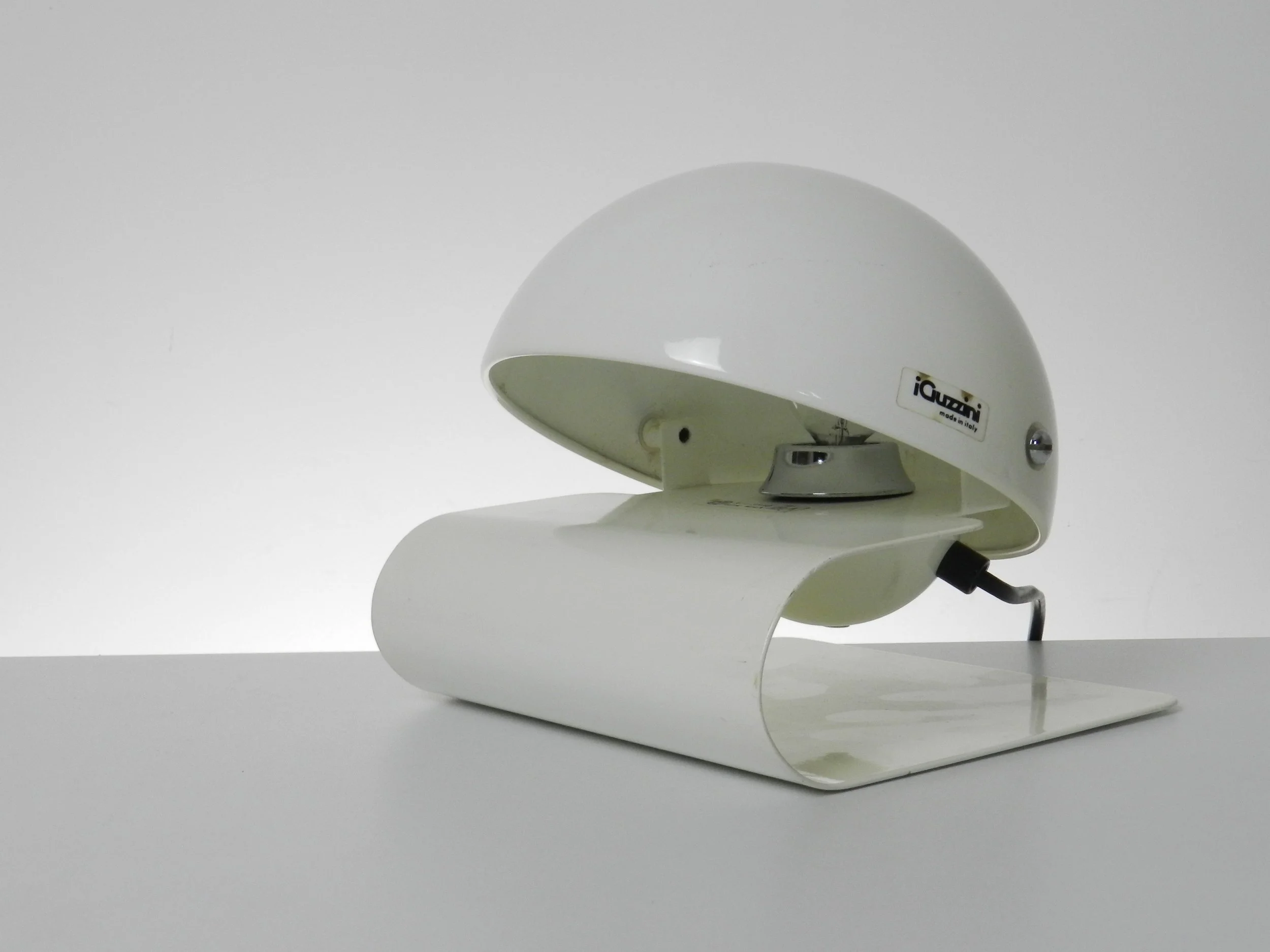 Space age Bugia lamp designed by Giuseppe Cormio for Guzzini.  In enameled metal with adjustable visors.  Italy, 1970s.