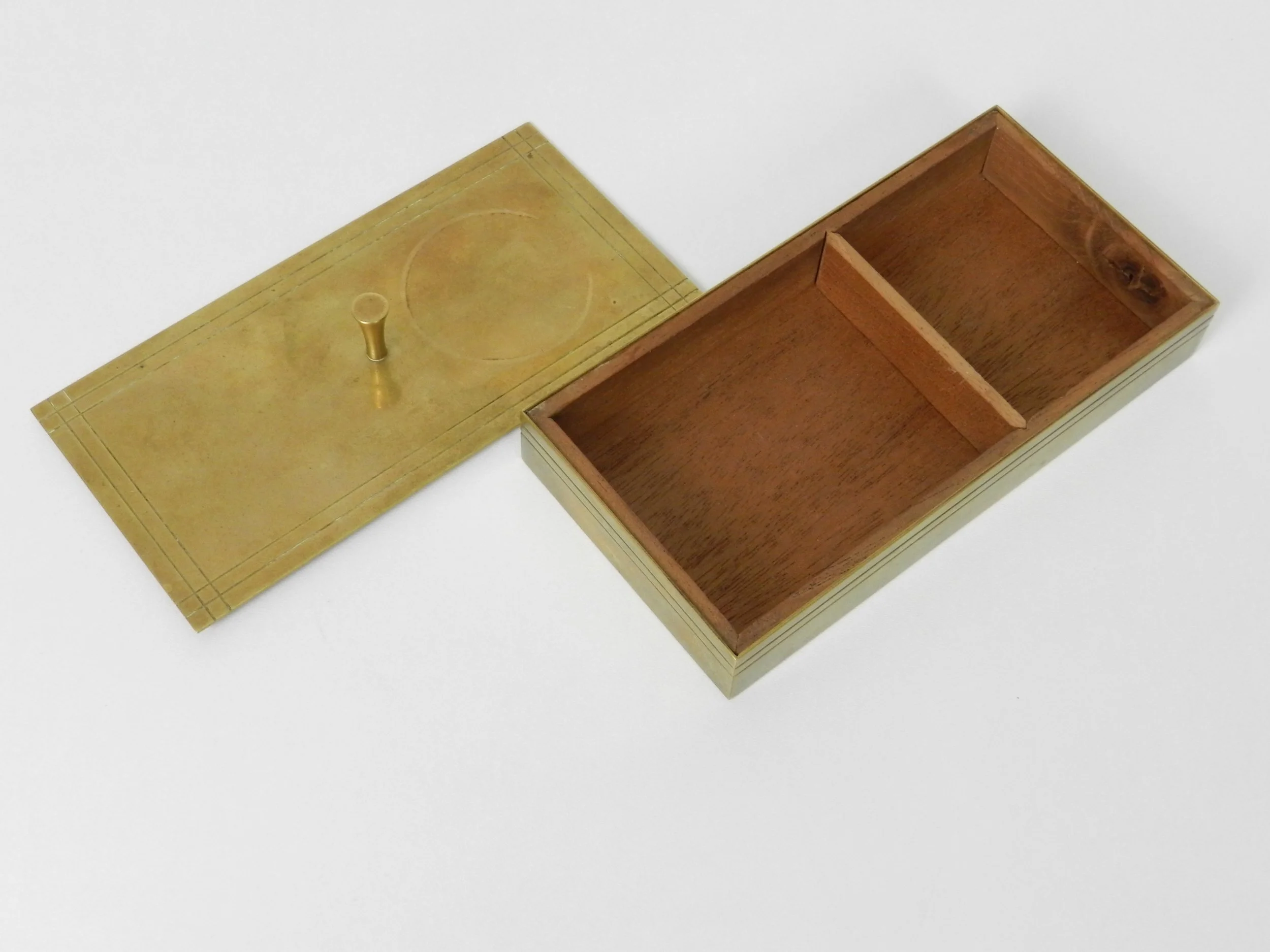 Small brass jewelry box with wood interior designed by Tommi Parzinger for Dorlyn Silversmiths.  USA, 1950s.