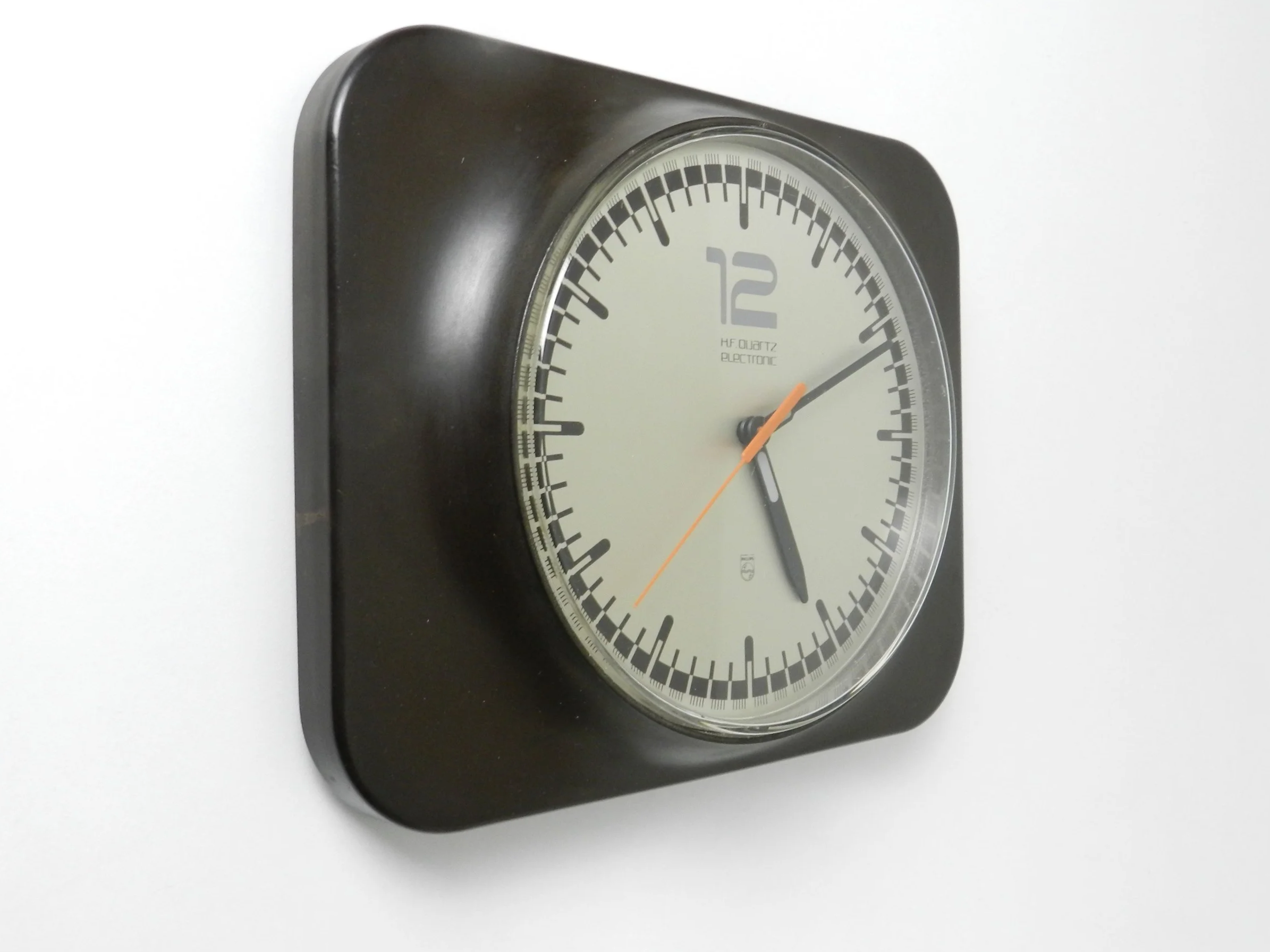 Modernist wall clock in plastic by Philips.  Germany, 1970s.