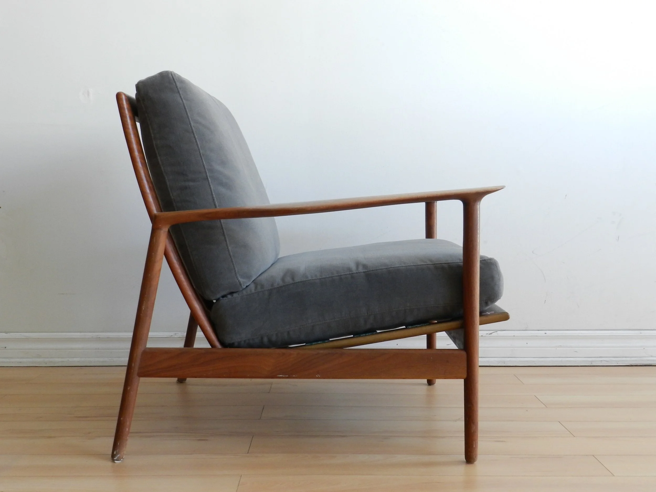 Teak lounge chair designed by Ib Kofod Larsen for Selig.  Denmark, 1960s.