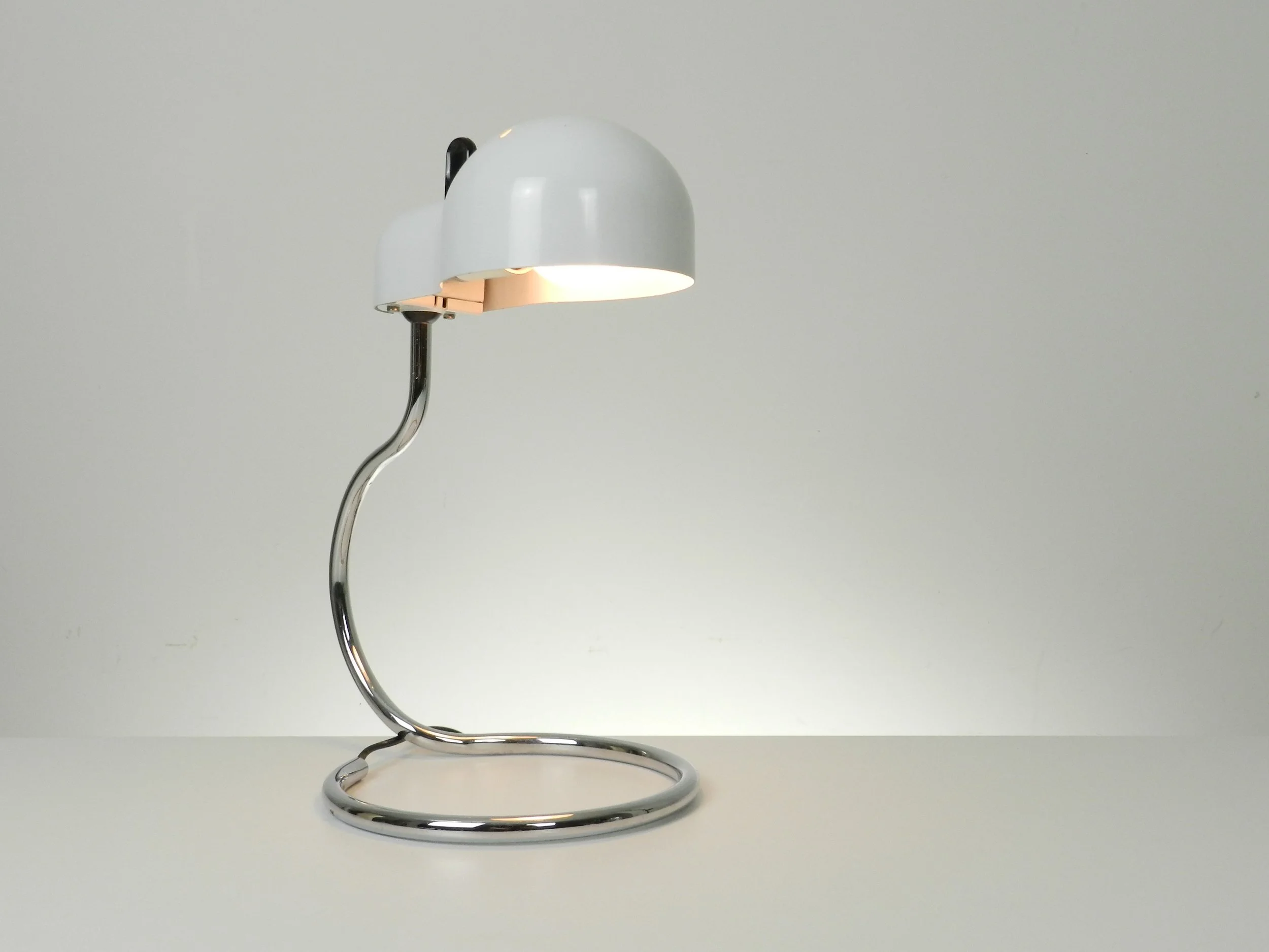 Minitopo table lamp designed by Joe Colombo for Stilnovo.  Italy, 1970s.