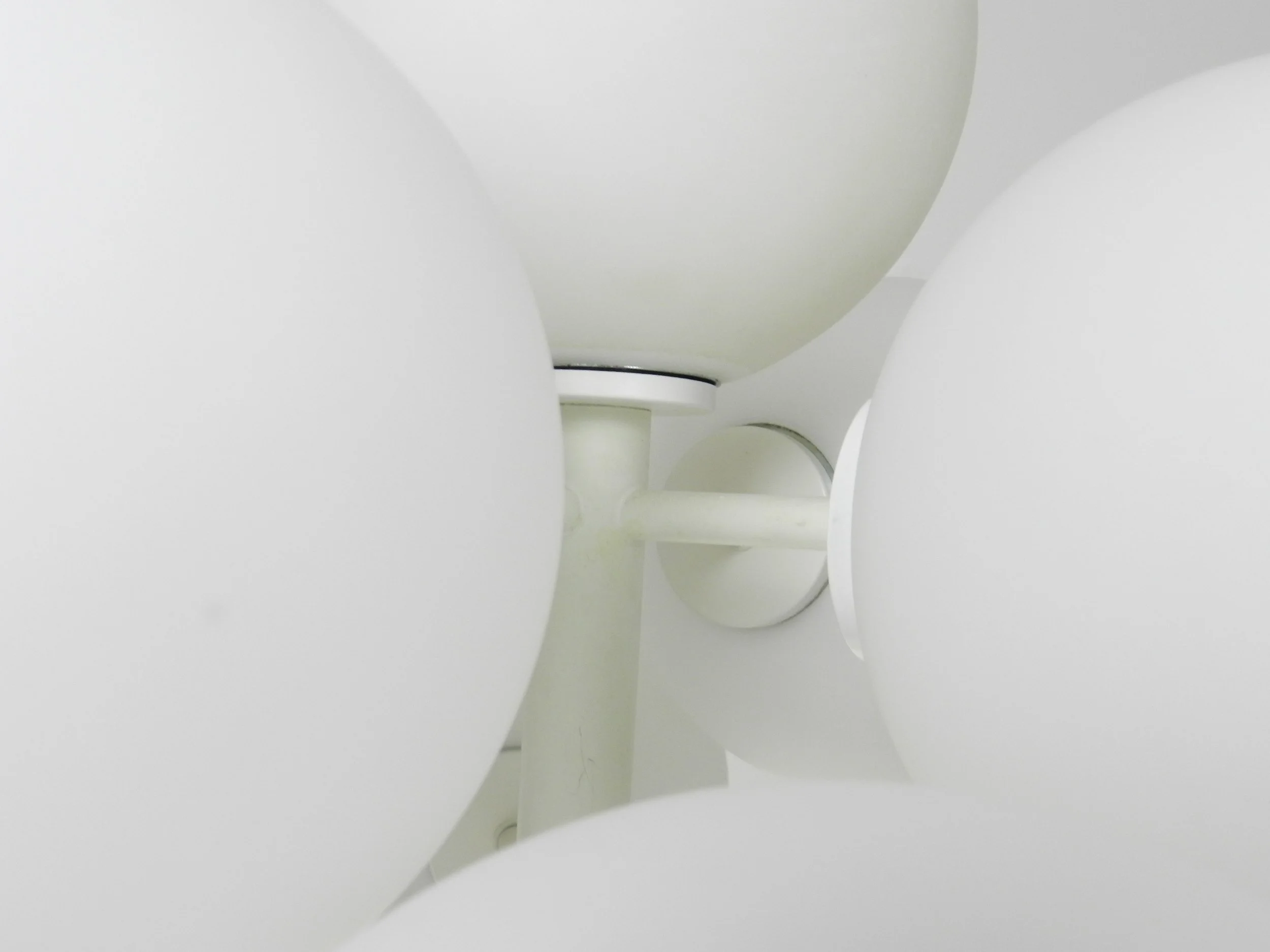 Modernist lamp designed by Eva Renee Nele for Temde. White lacquered metal and opal glass.  Switzerland, 1960s.