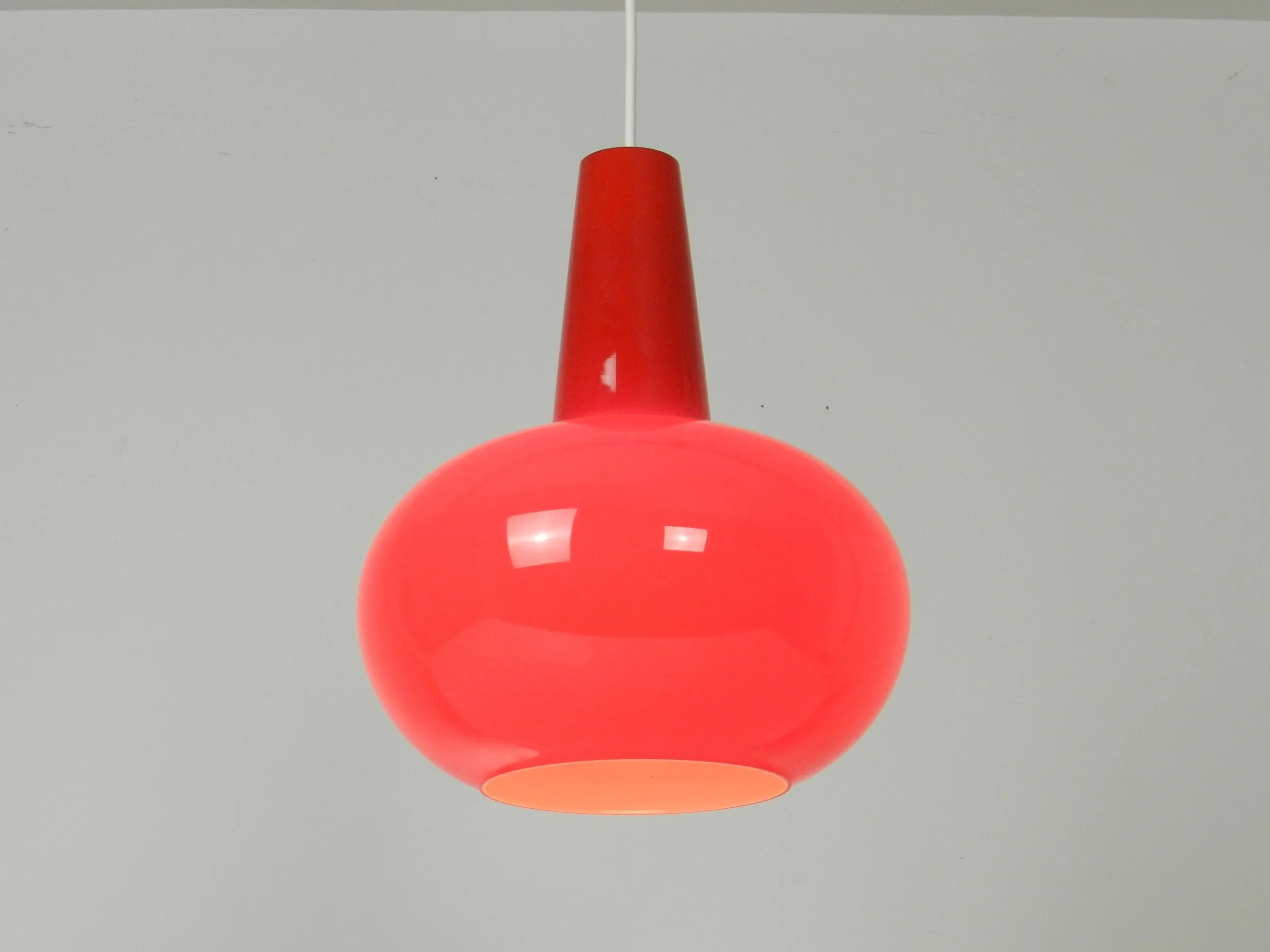 Mid century modern cased glass pendant lamp by Prescolite.  USA, 1960s.