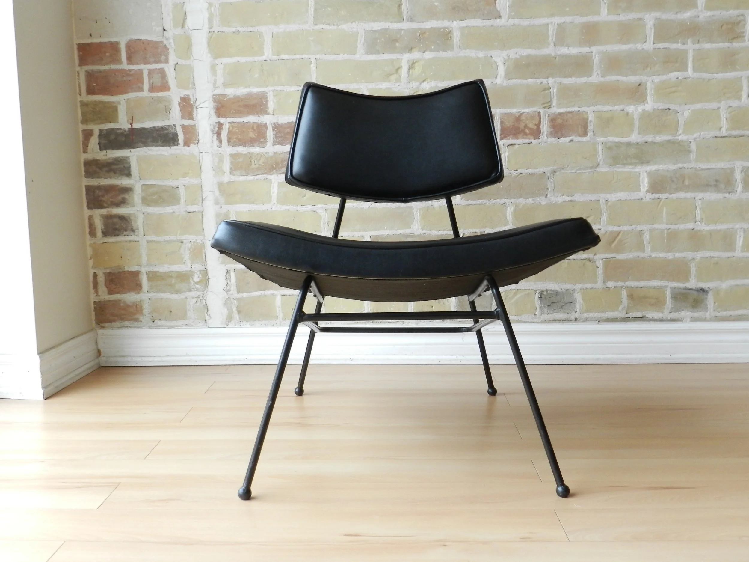 Pair of rare Canadian design Video Chairs by Arrow Bedding. Wrought iron and bent plywood with vinyl upholstery.  Canada, 1950s.