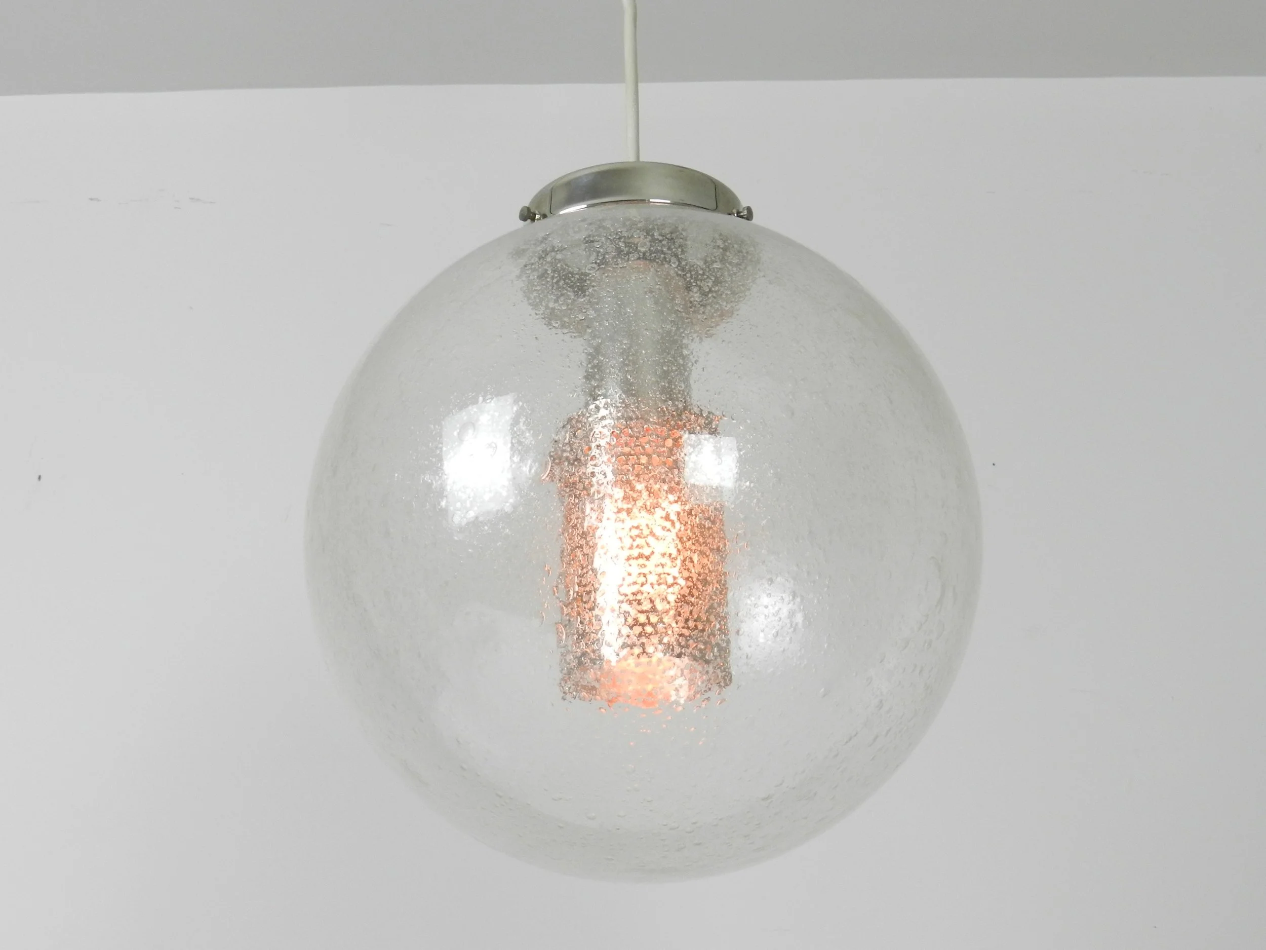 Vintage bubbble glass pendant with chrome hardware. Possibly by Lightolier.  circa 1970s