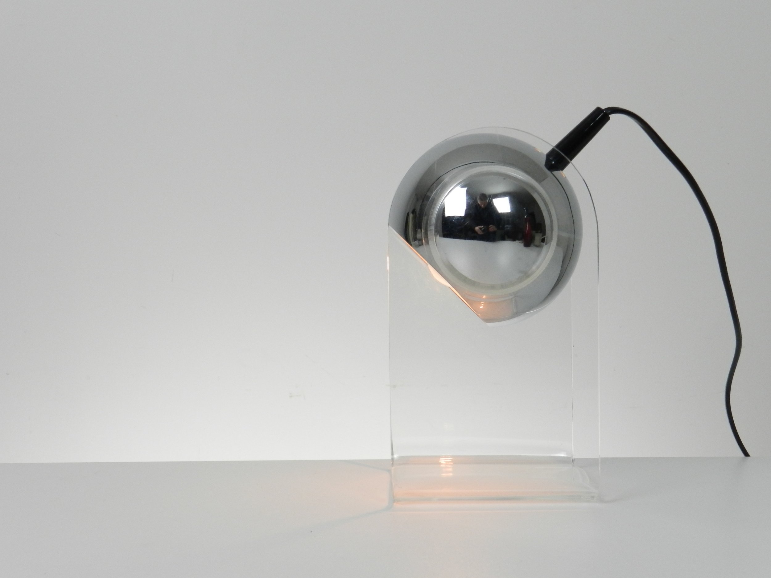 Space age eyeball lamp in the style of Gino Sarfatti. Chromed steel and lucite.  circa 1980s.