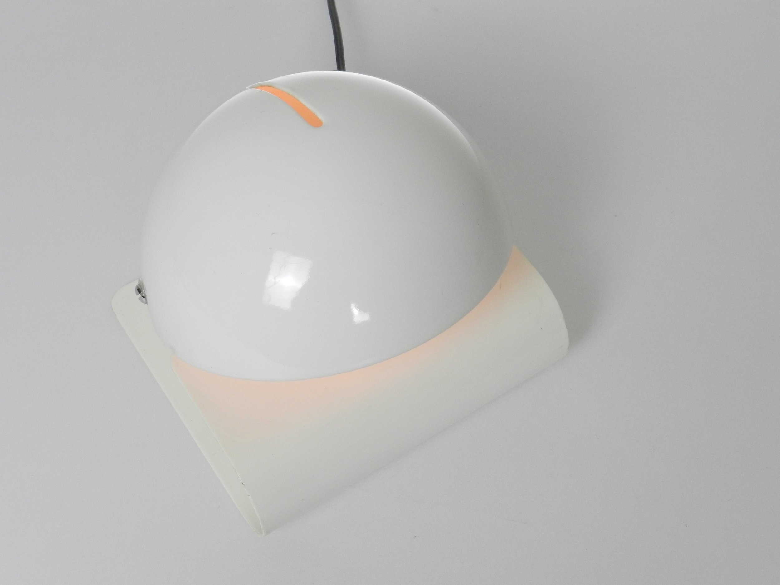 Space age Bugia lamp designed by Giuseppe Cormio for Guzzini.  In enameled metal with adjustable visors.  Italy, 1970s.