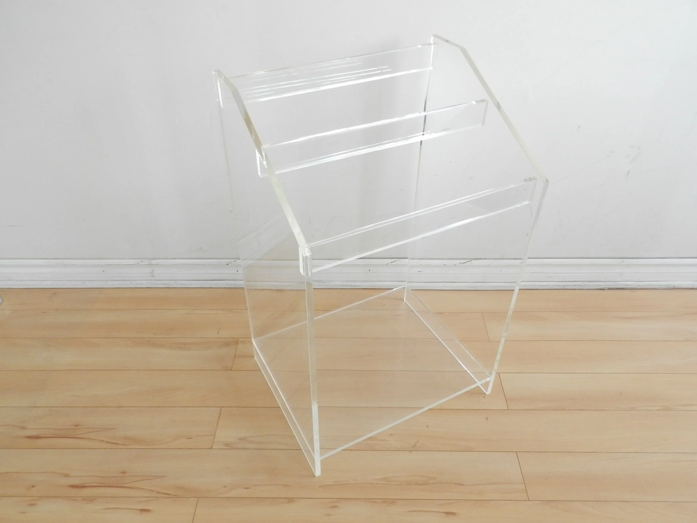 Freestanding towel/blanket rack in lucite.  circa 1980s.