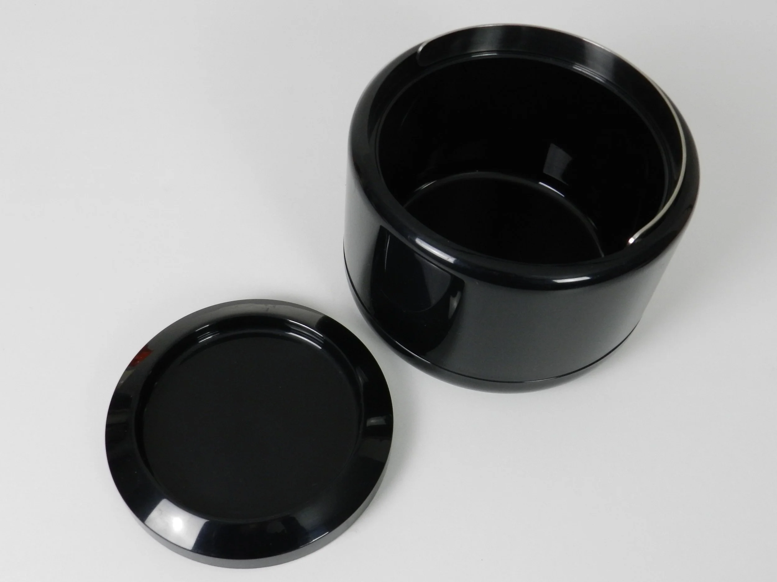 Modernist plastic ice bucket with stainless steel handle designed by Erik Magnussen for Stelton.  Denmark, 1970s.