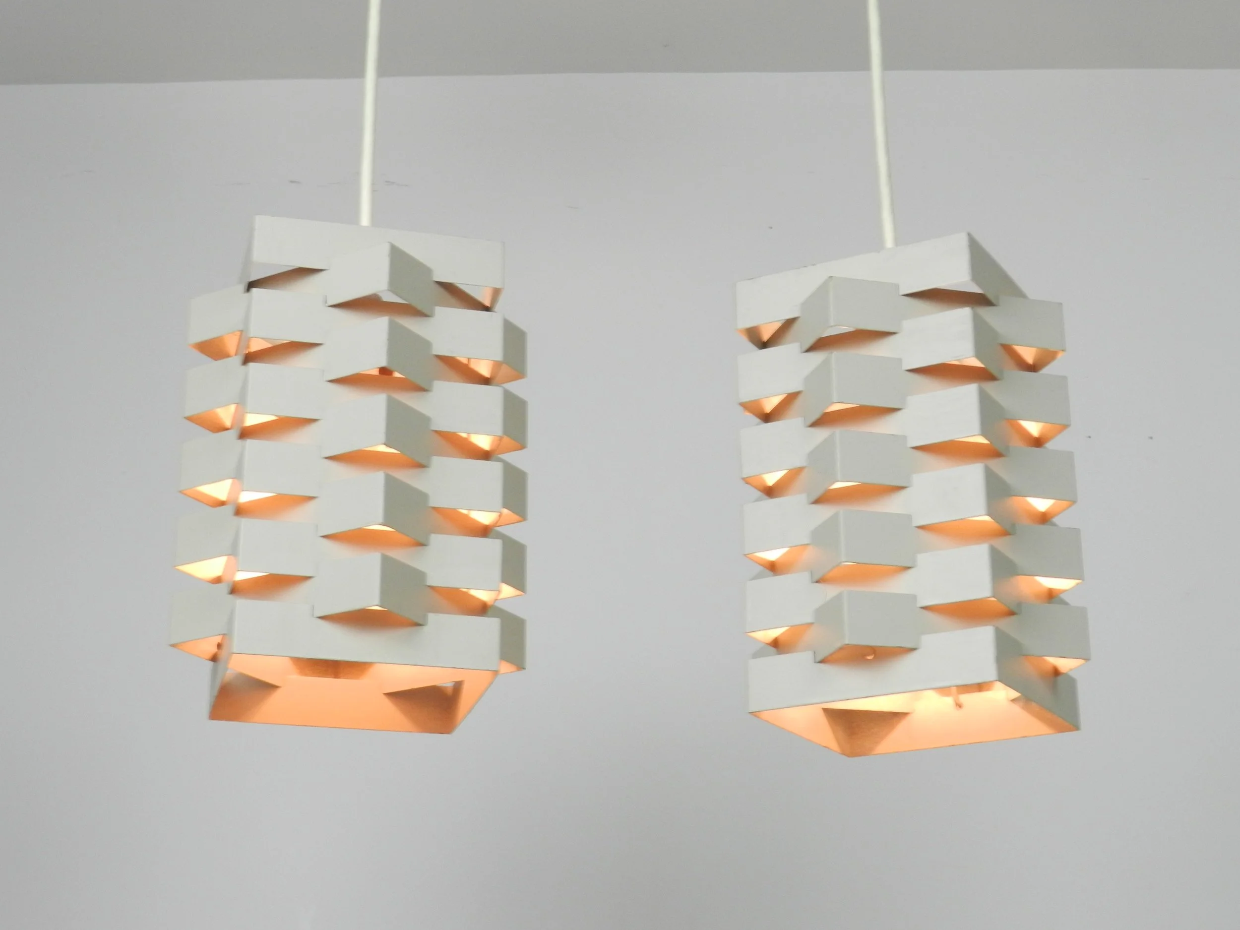 Mid century modern pendant lamps designed by Niels Esmann and Hans C. Jensen for Nordisk Solar.  Denmark, 1960s.