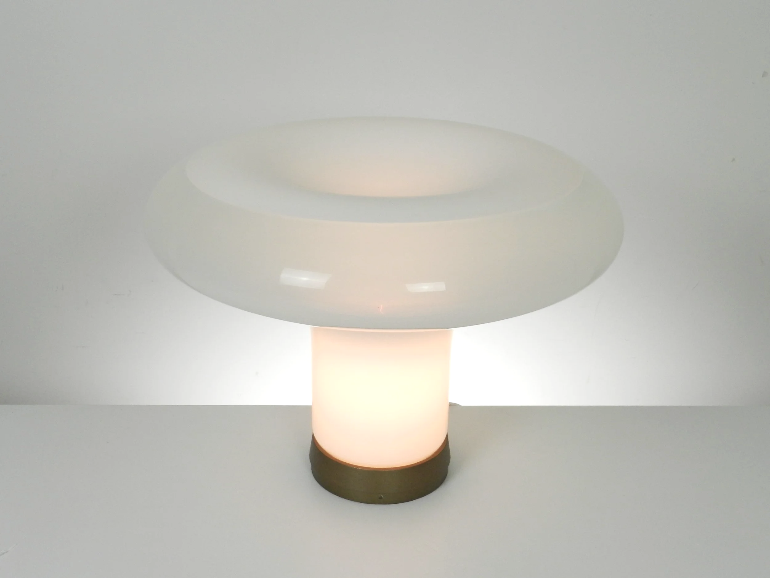 Lesbo lamp designed by Angelo Mangiarotto for Artemide. Hand blown opal Murano glass on aluminum base.  Italy