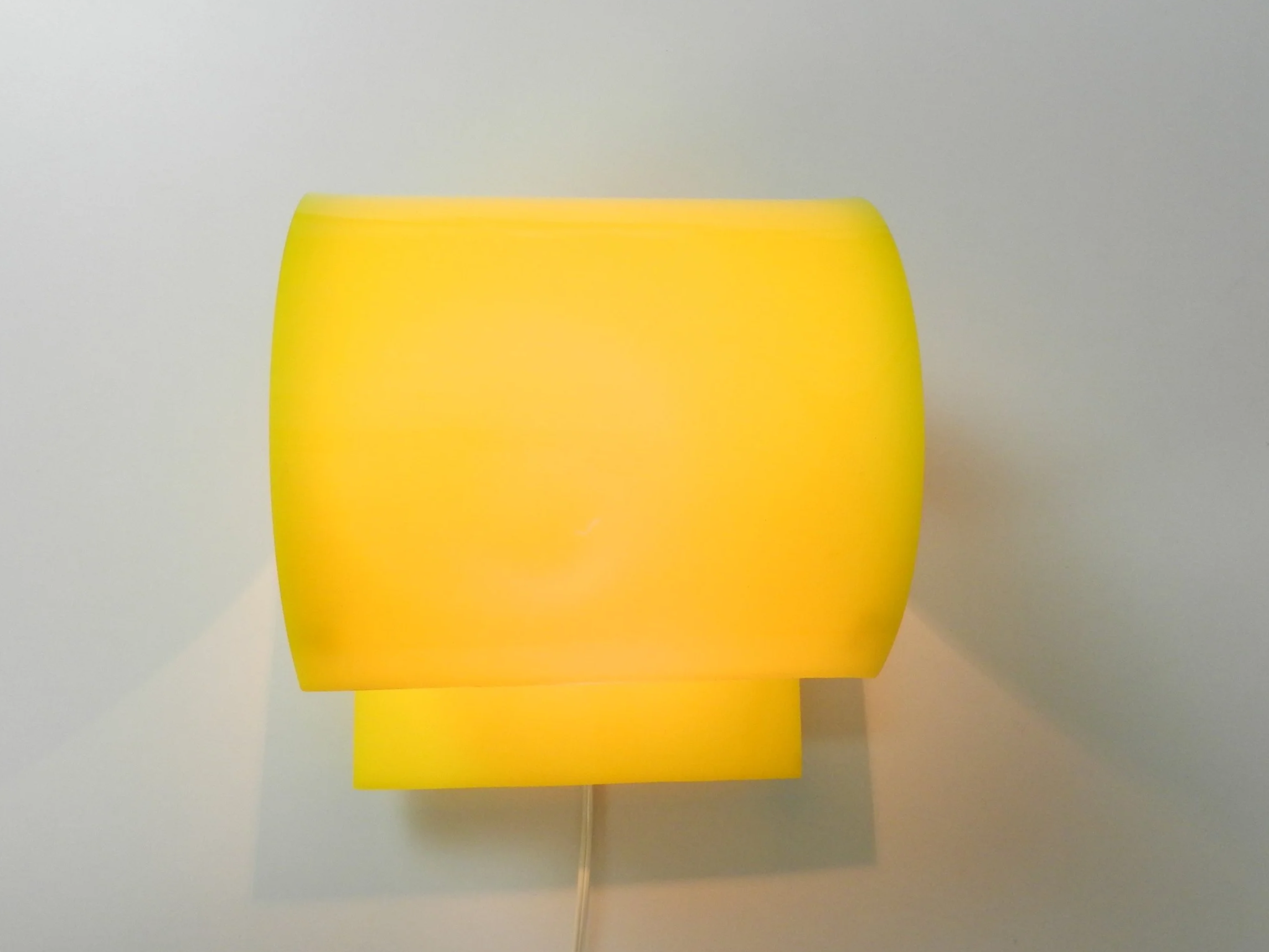 Space age Glo-Up acrylic wall sconce designed by Douglas Ball and John Berezowsky for Danesco.  Canada, 1970s.