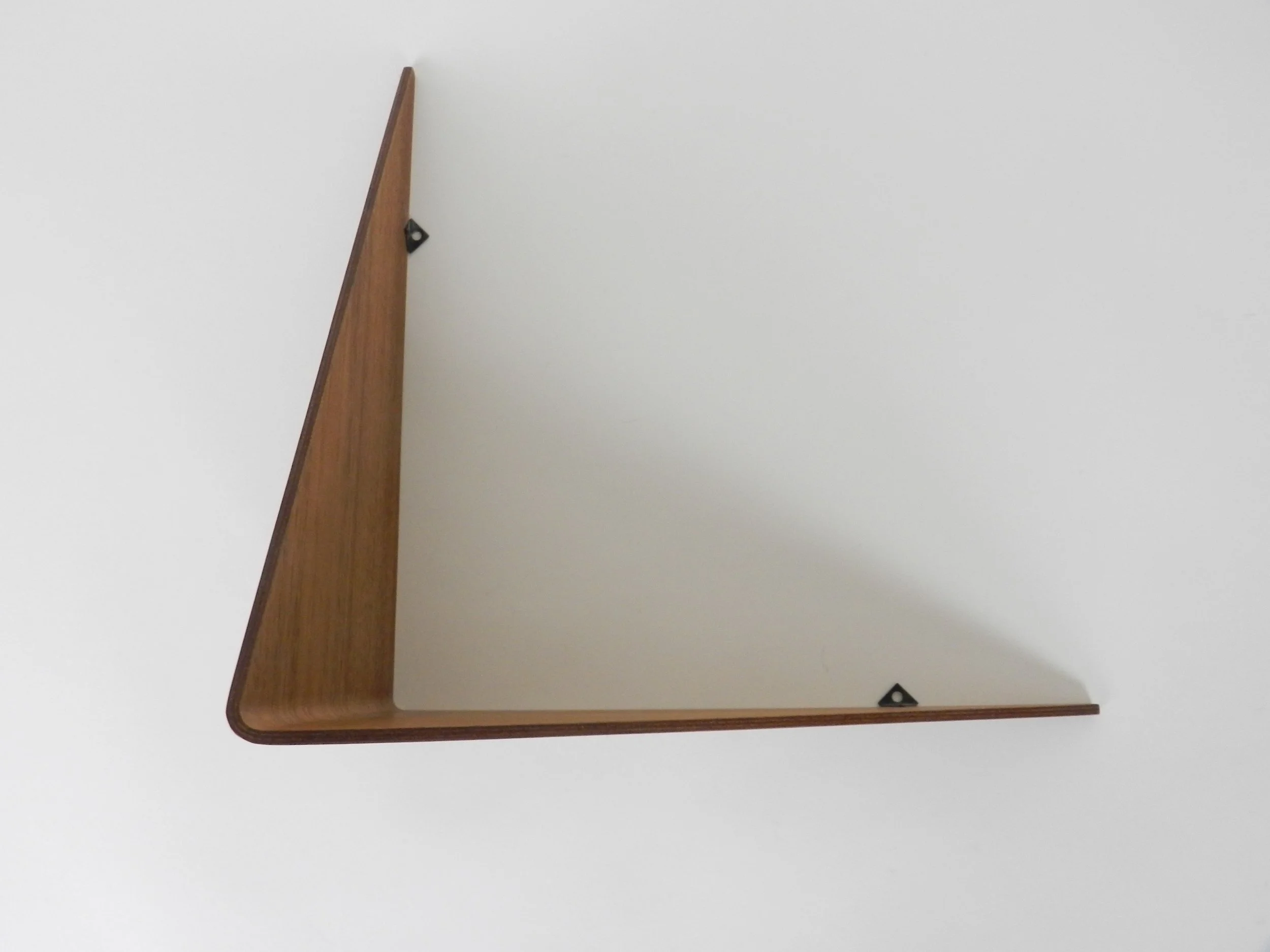 Wall shelf in bent plywood with teak veneer, designed by Poul Cadovius.  Denmark, 1960s.