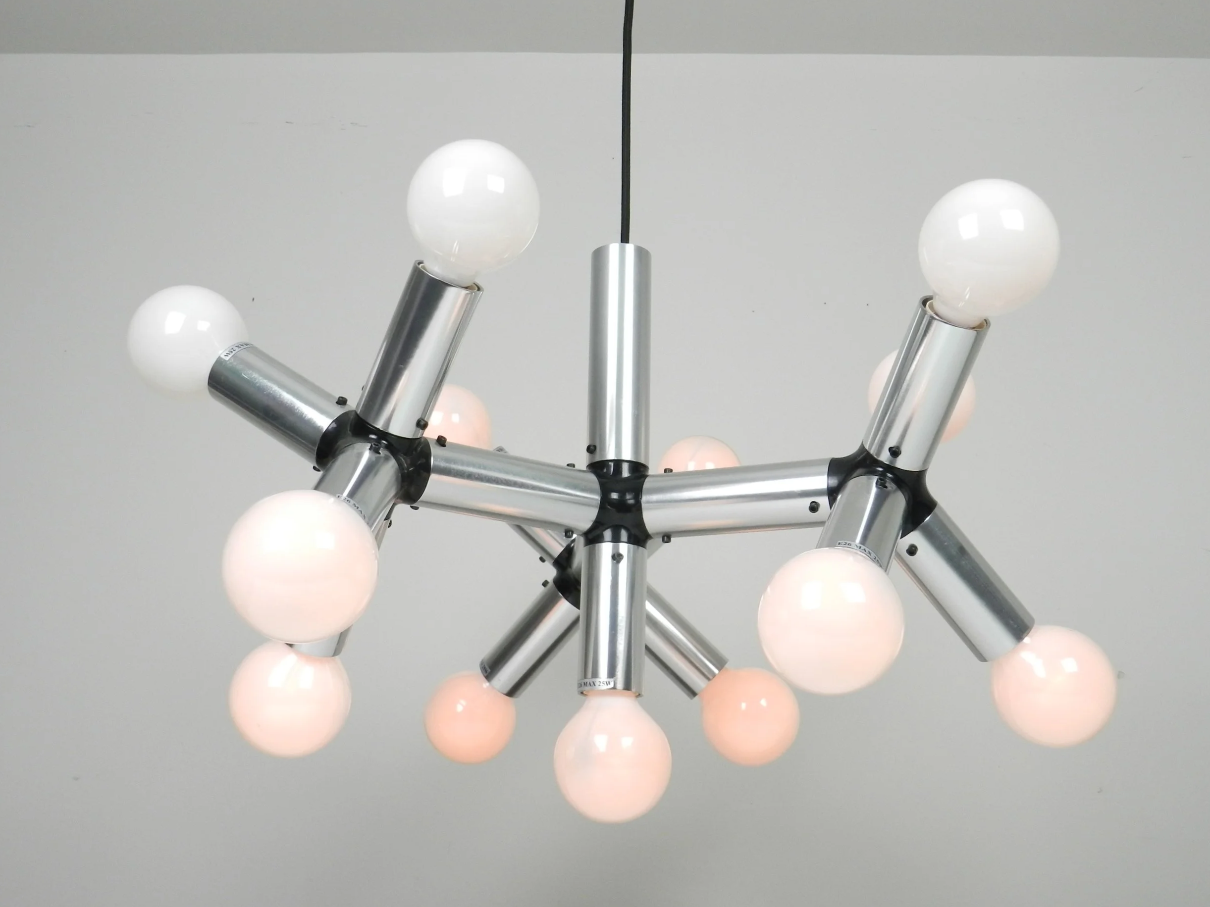 Chandelier in alumunum and plastic designed by Robert Haussmann for Swiss Lamps International.  Switzerland, 1960s.