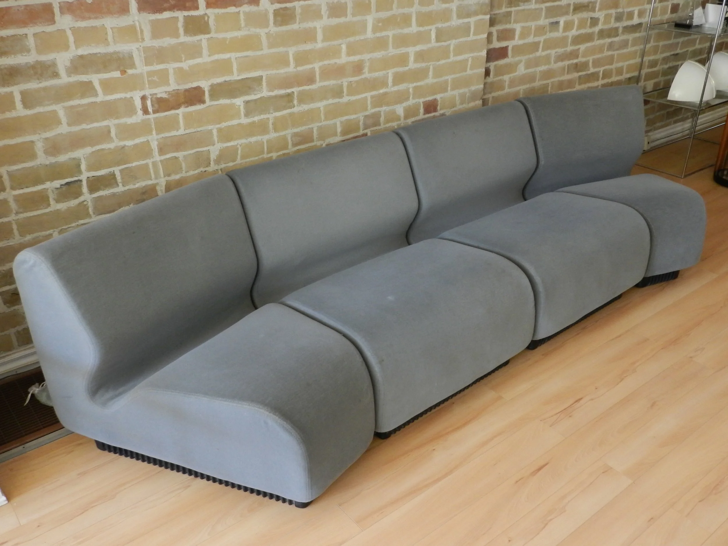 Modular four piece sofa designed by Don Chadwick for Herman Miller.