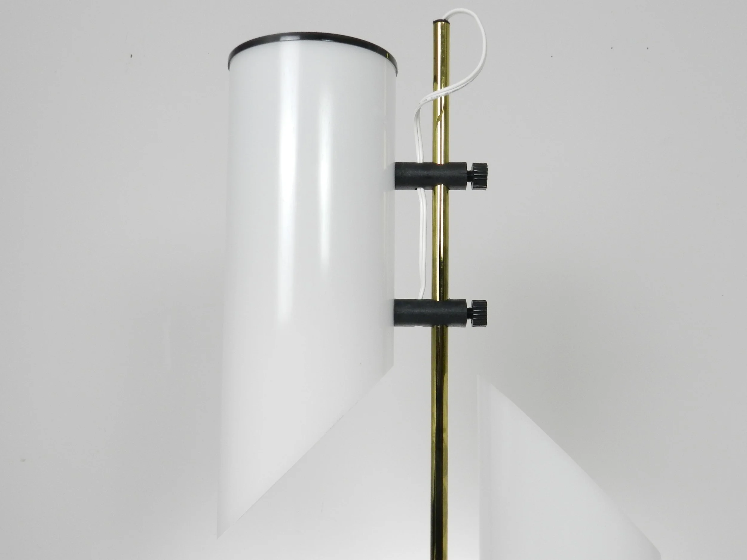 Vintage modern lamp in acrylic, brass and enameled metal.  circa 1970s.