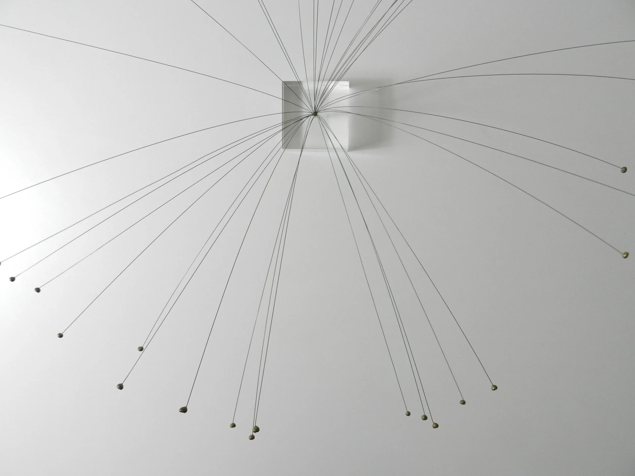 Kinetic spray sculpture in wire on lucite base.  circa 1970s.