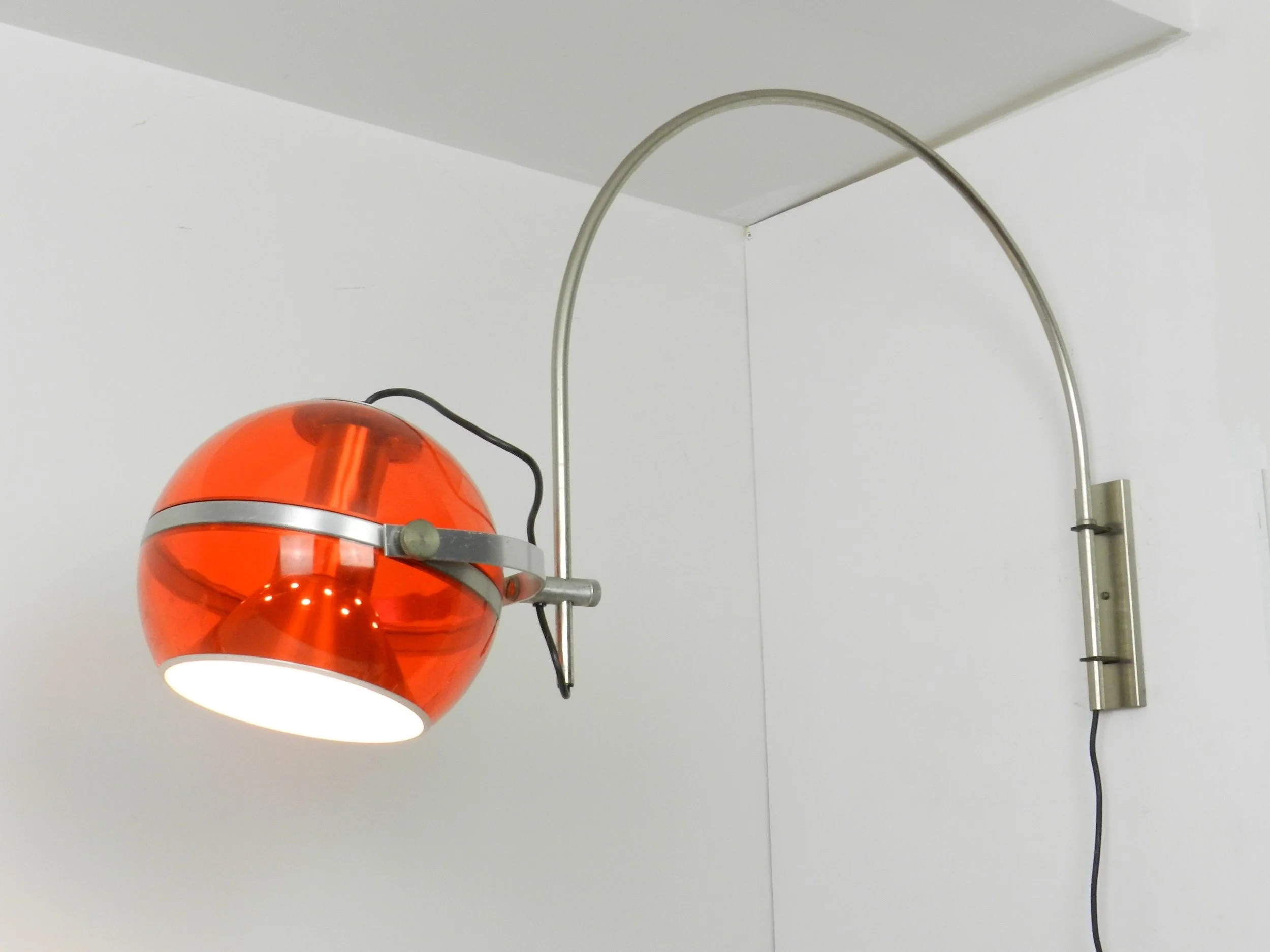 Space age arc wall lamp by Dijkstra.  Netherlands, 1970s