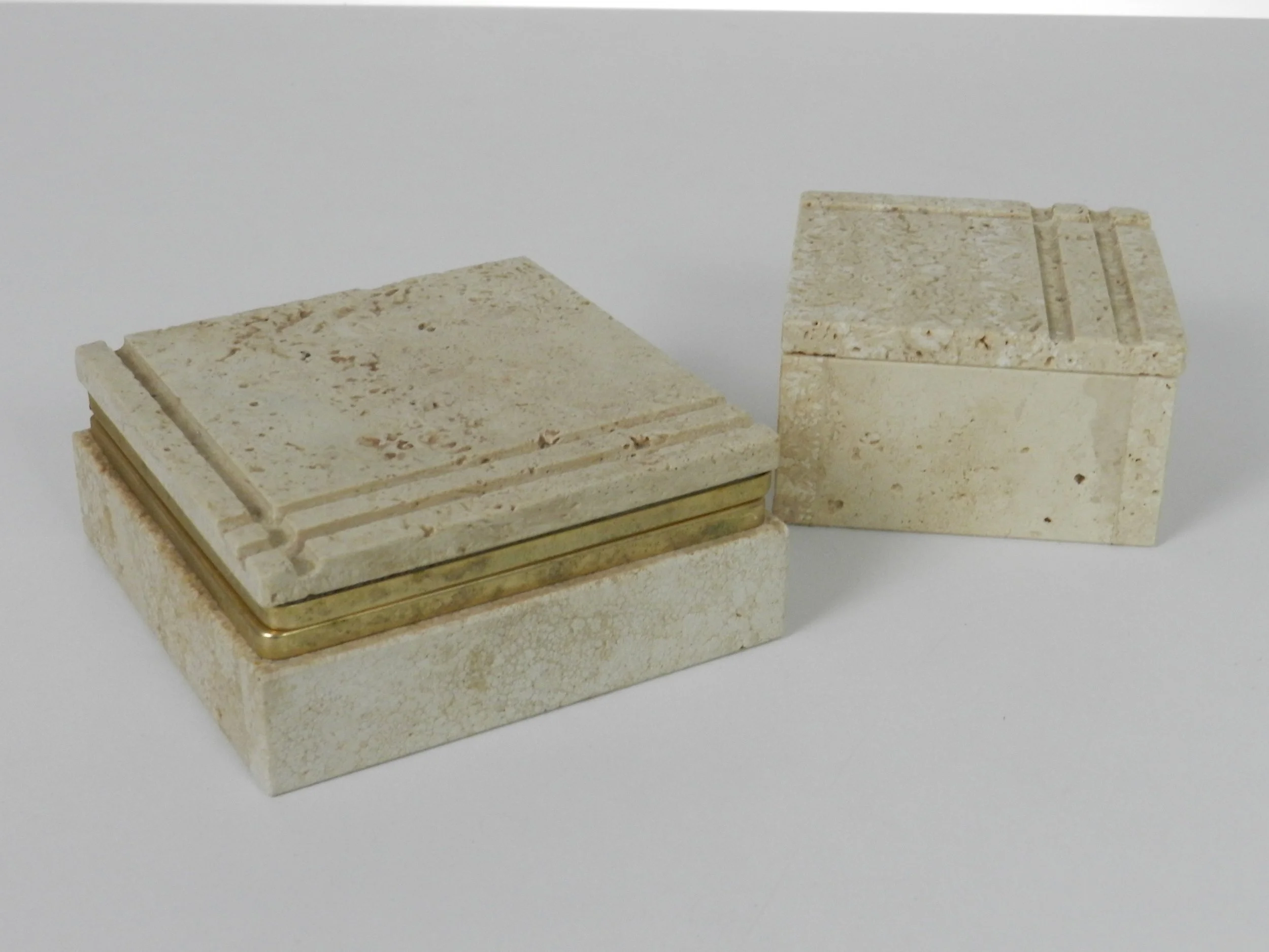 Pair of travertine boxes in the style of Fratelli Mannelli.  Italy, 1970s.