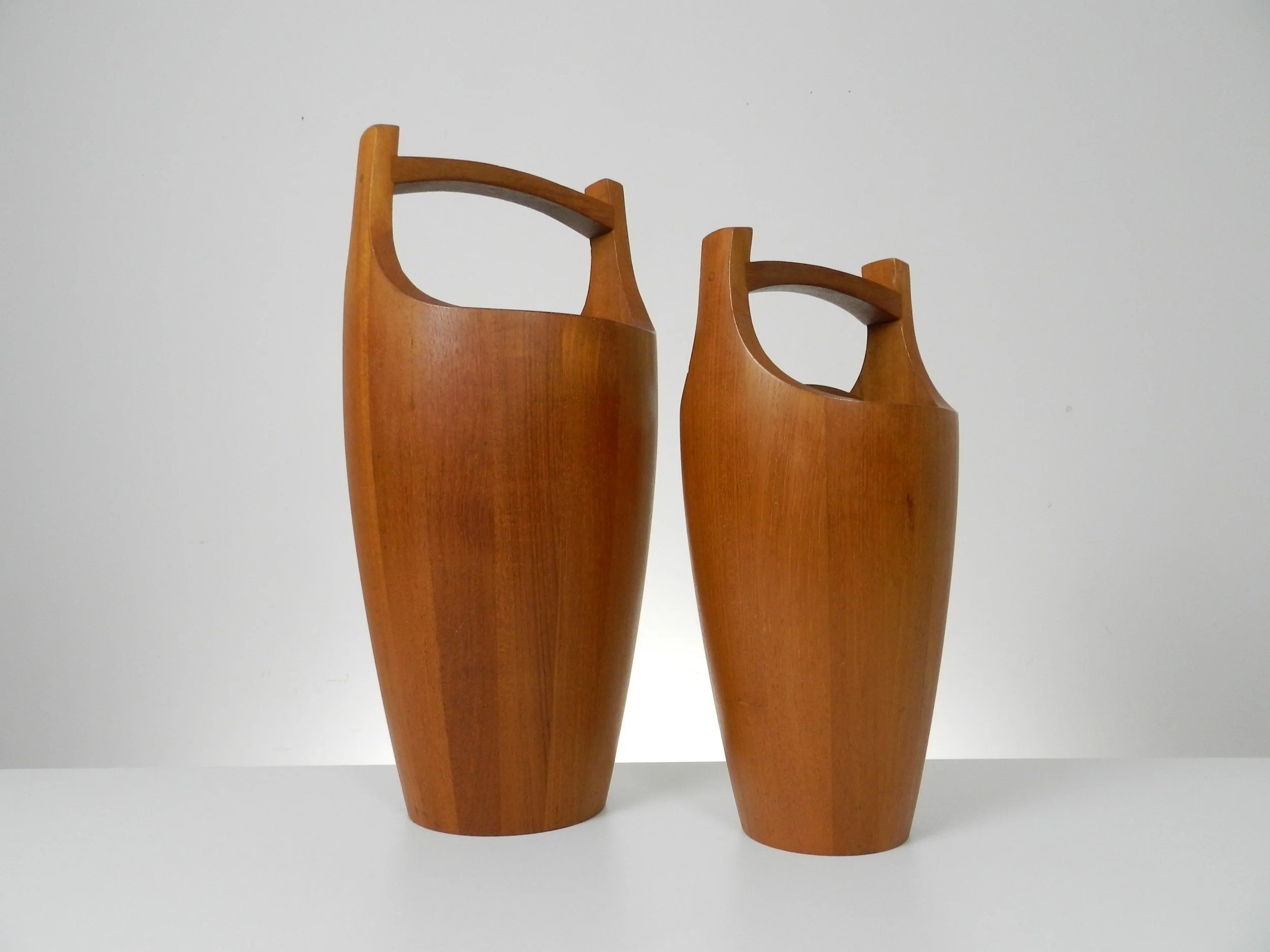 Congo ice buckets in staved teak designed by Jens Quistgaard for Dansk.  Denmark, 1960s.
