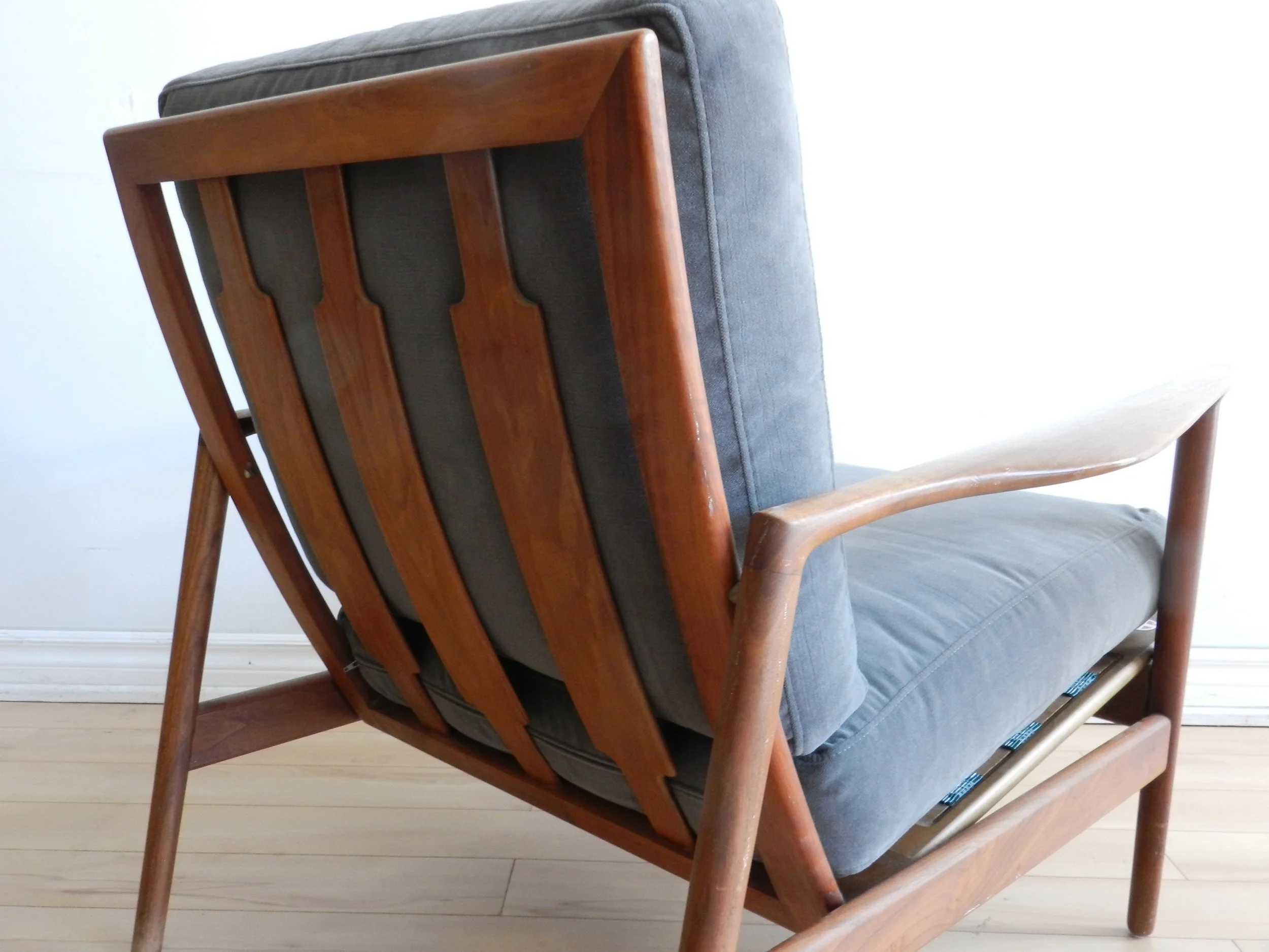 Teak lounge chair designed by Ib Kofod Larsen for Selig.  Denmark, 1960s.