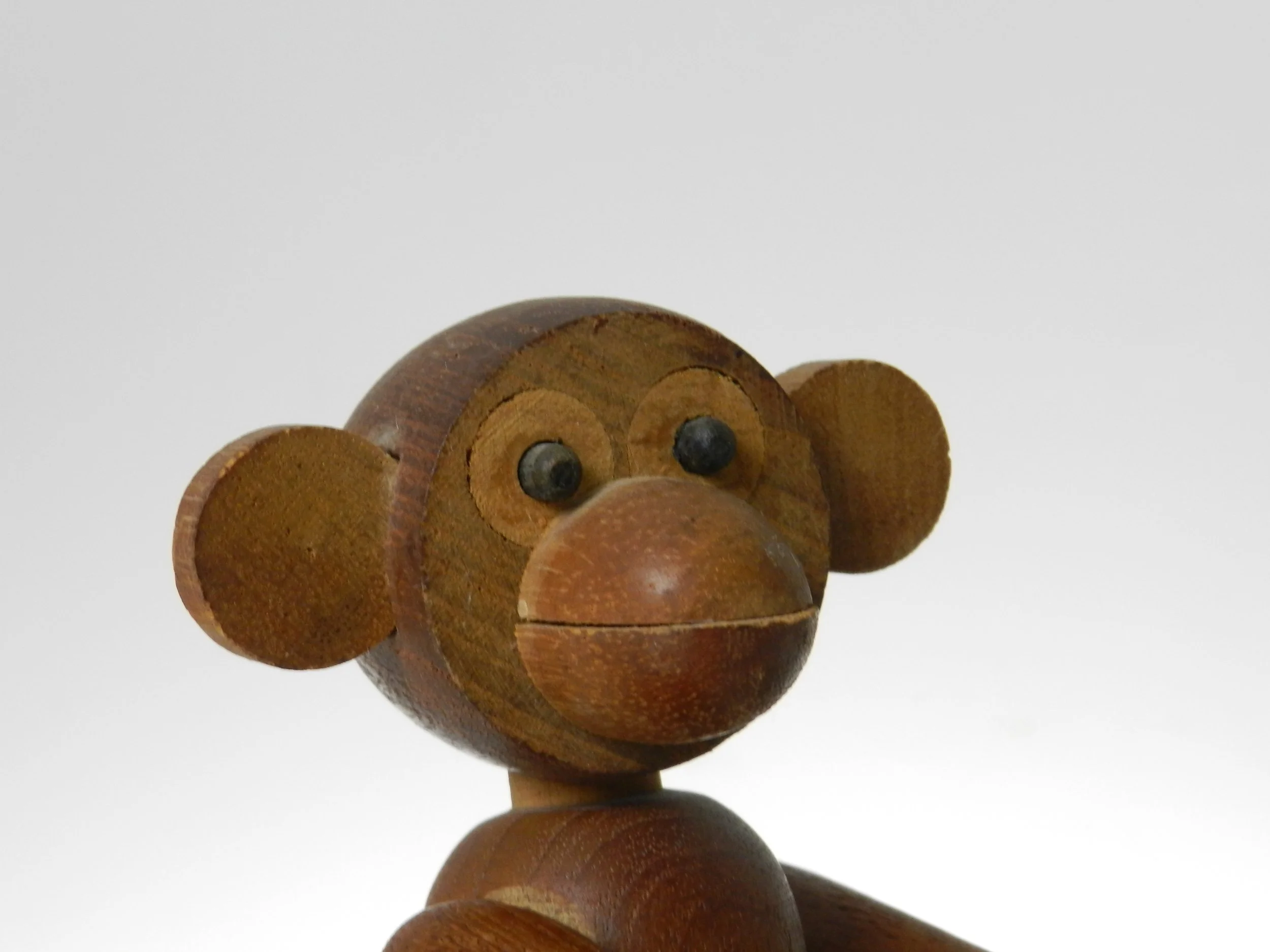 Vintage teak monkey in the style of Kay Bojesen.  circa 1960s.