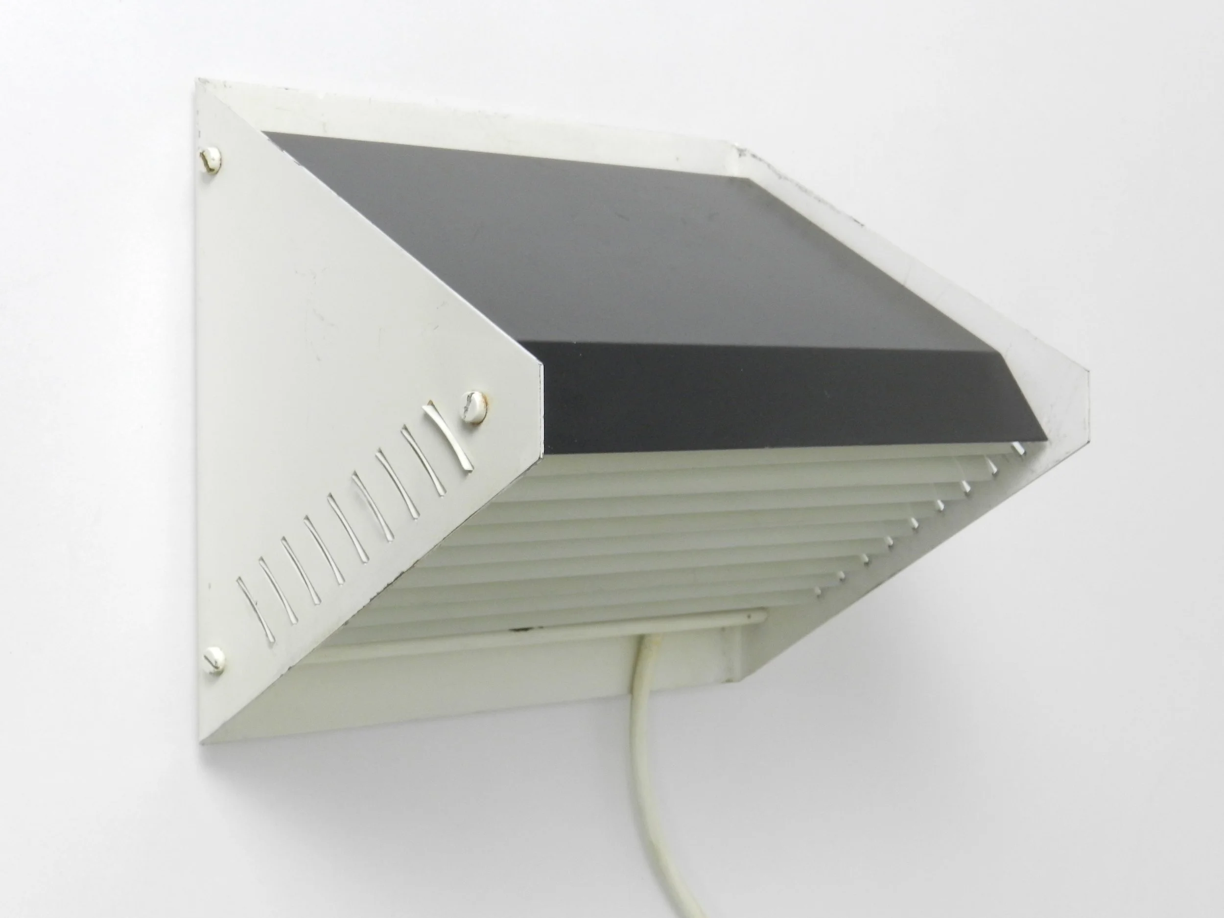 Mid century modern rare wall lamp by Raak.  Netherlands, 1960s.