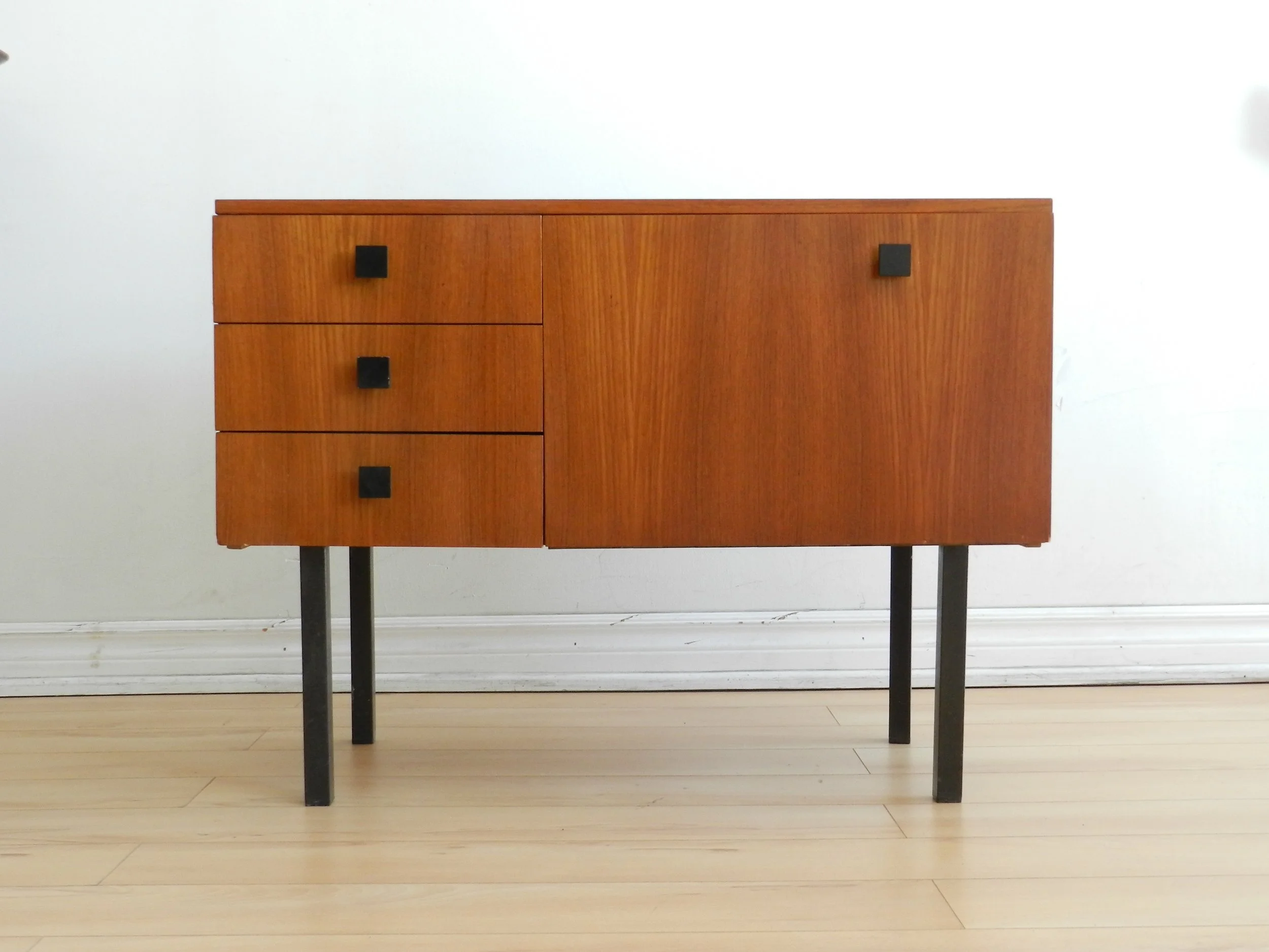 Teak entry or bar cabinet with metel legs and hardware.  Scandinavia, 1970s.
