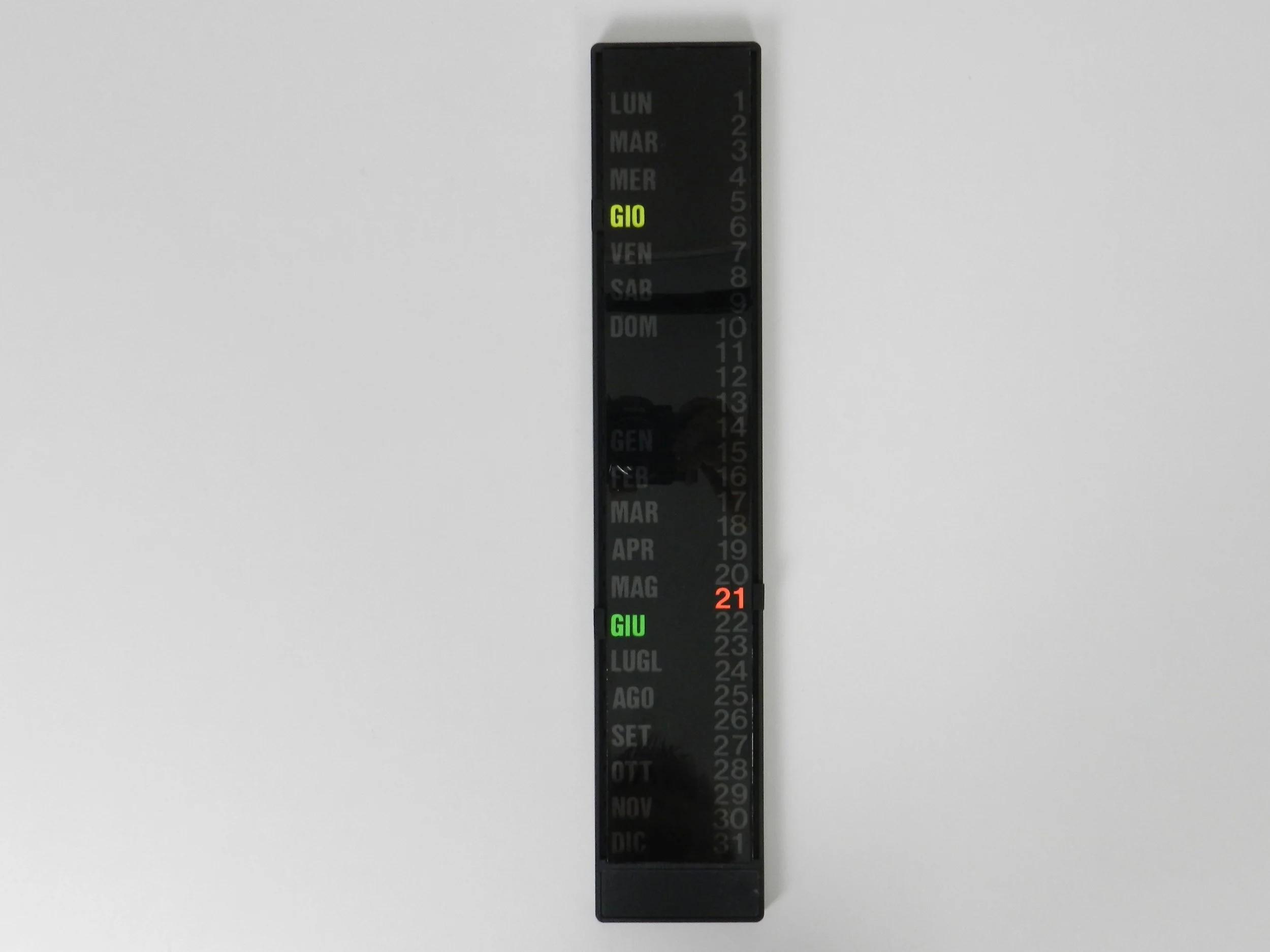 Post modern perpetual calendar in Italian.  circa 1980s.