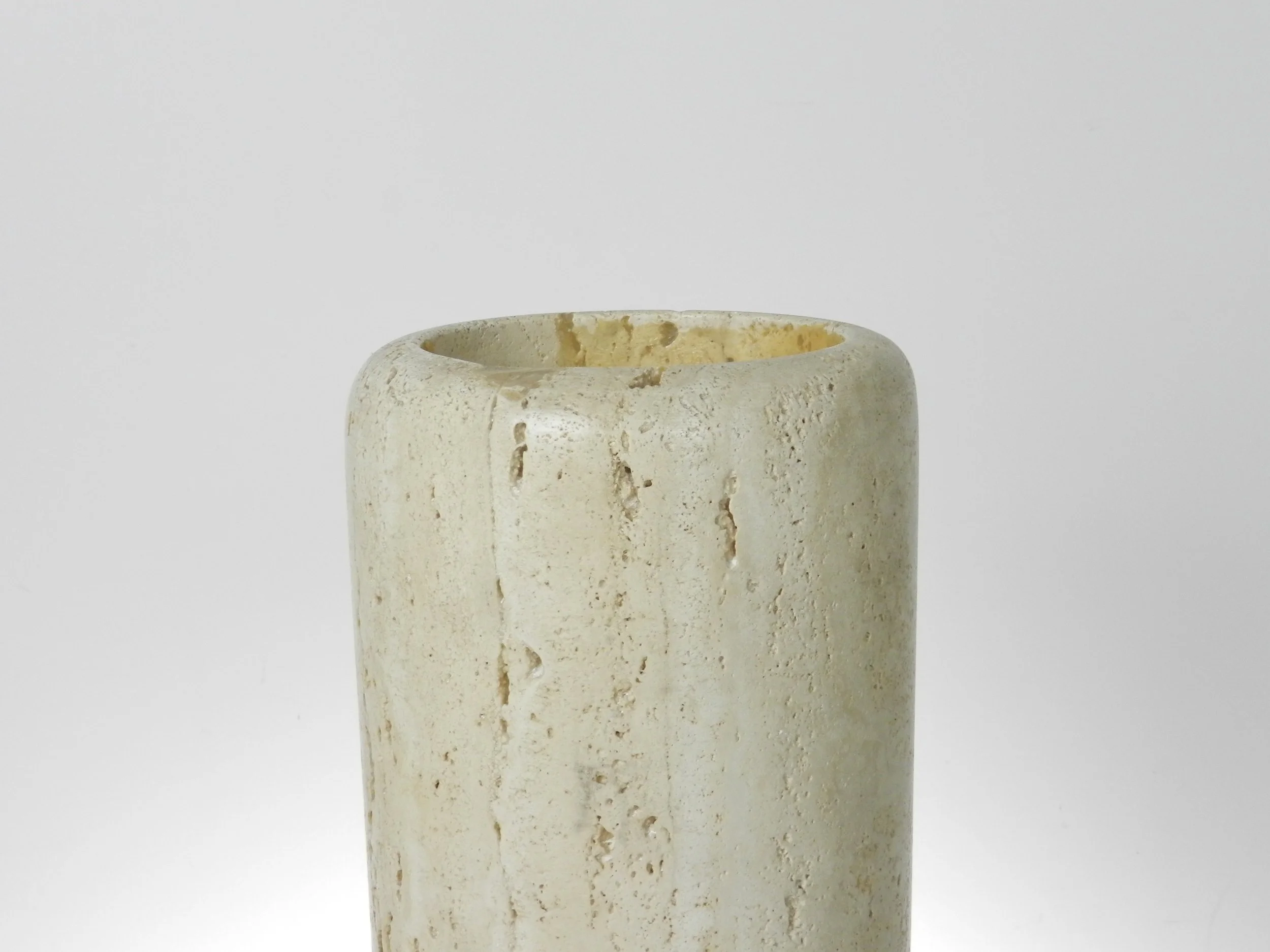 Tall travertine dry vase by Raymor.  Italy, 1970s.