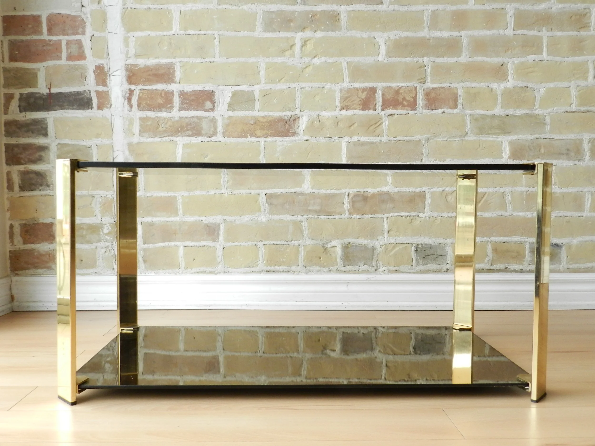 Compact coffee table in brass, tinted glass and tinted mirror by Cidue.  France, 1970s.