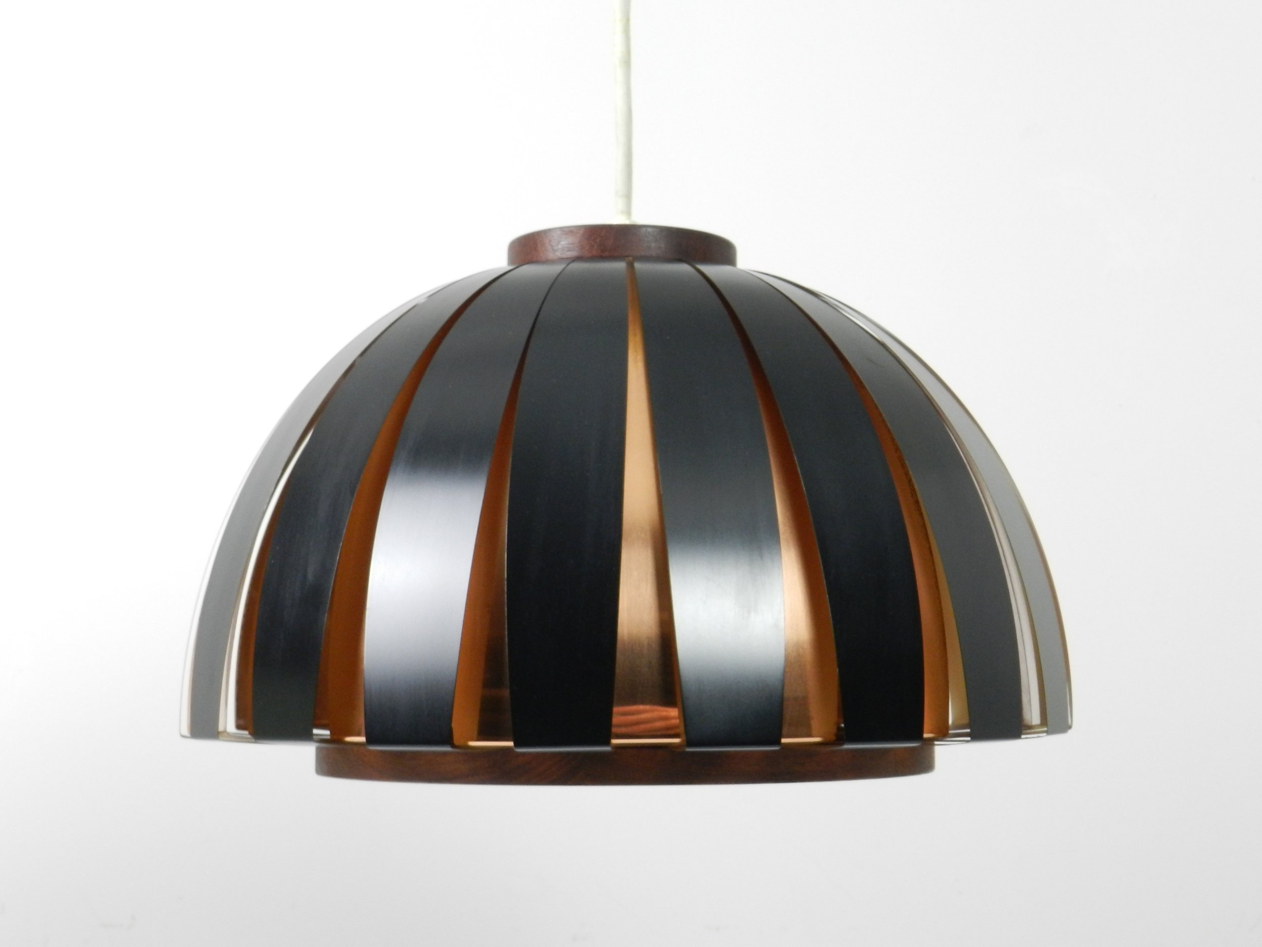 Fiesta pendant lamp designed by Svend Aage Holm Sorensen. Copper, enameled metal and teak.  Denmark, 1960s.
