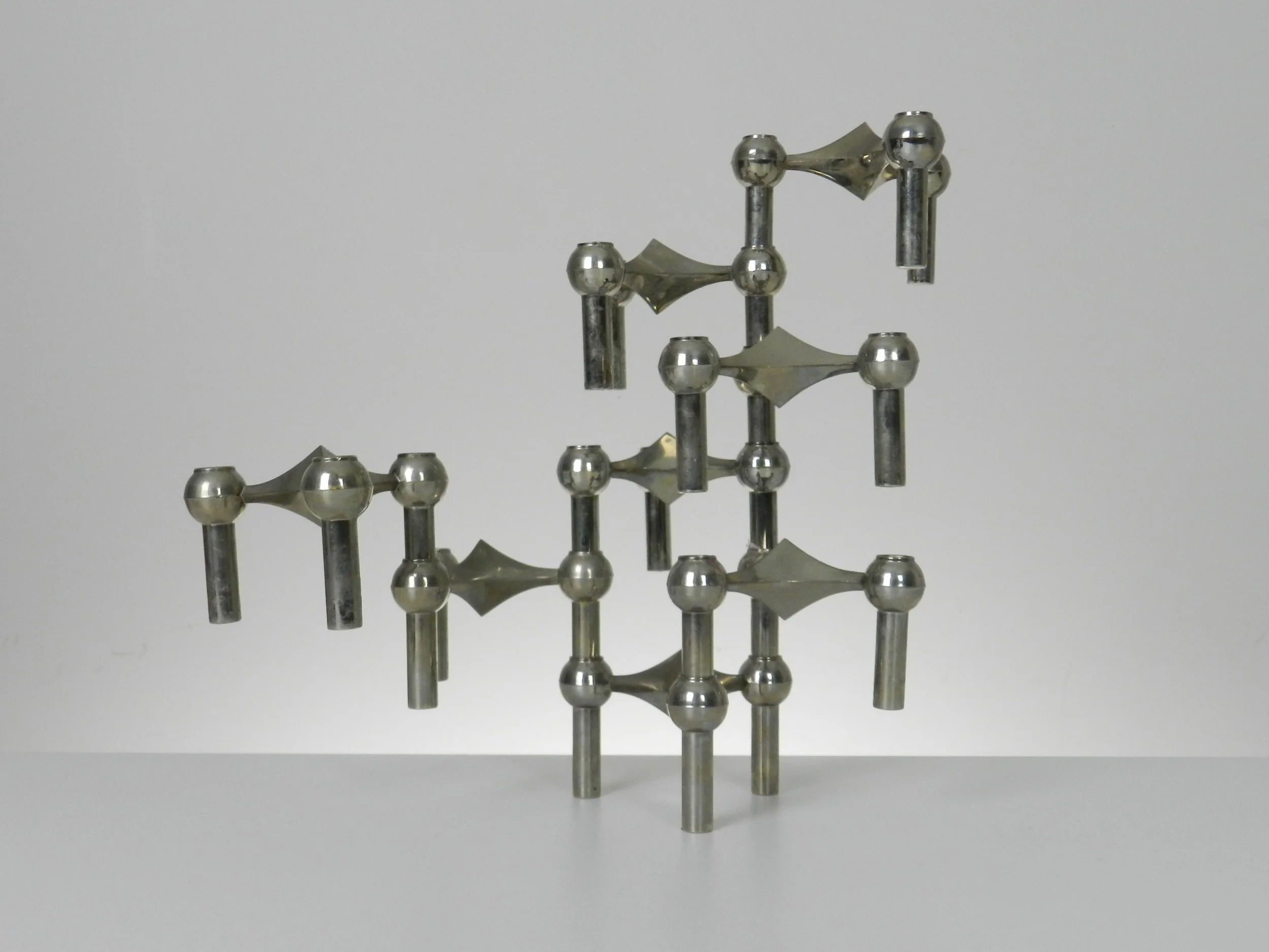 Set of 10 vintage chrome modular candle holders/sculpture designed by Ceasar Stoffi and Fritz Nagel.  Germany, 1960s.