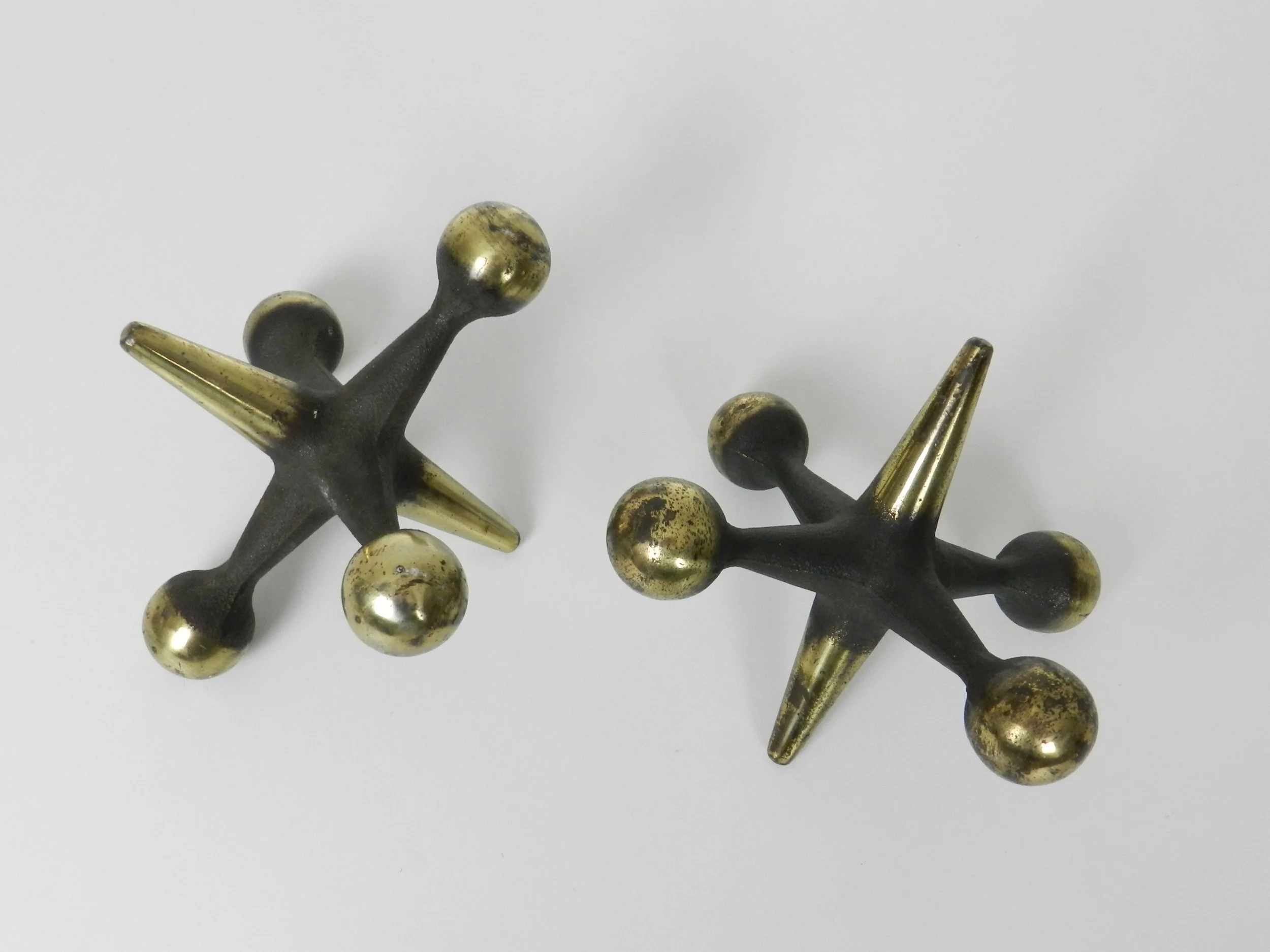 DPair of mid century cast iron bookends designed by Bill Curry for Design Line.  circa 1960s.