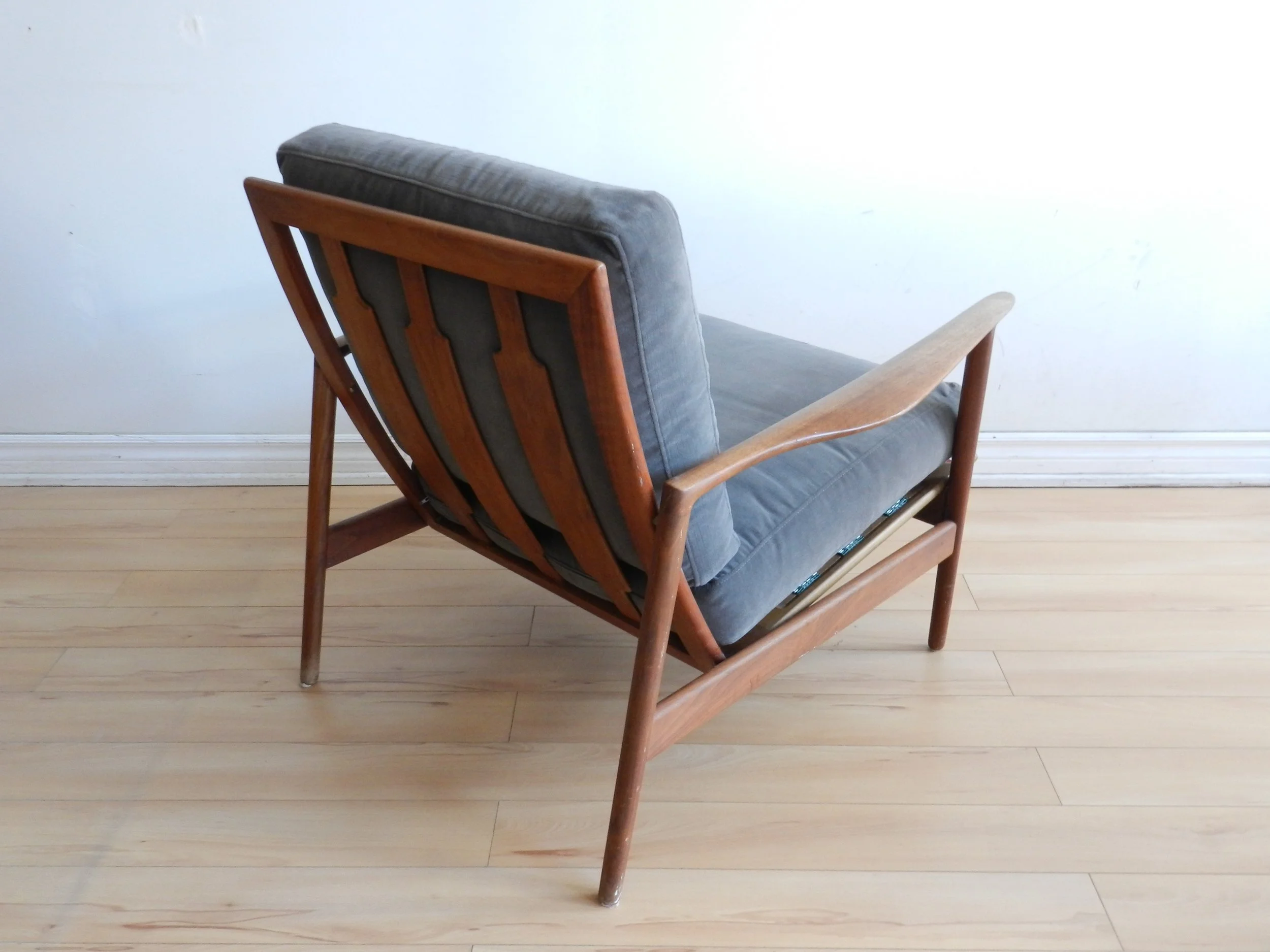 Teak lounge chair designed by Ib Kofod Larsen for Selig.  Denmark, 1960s.