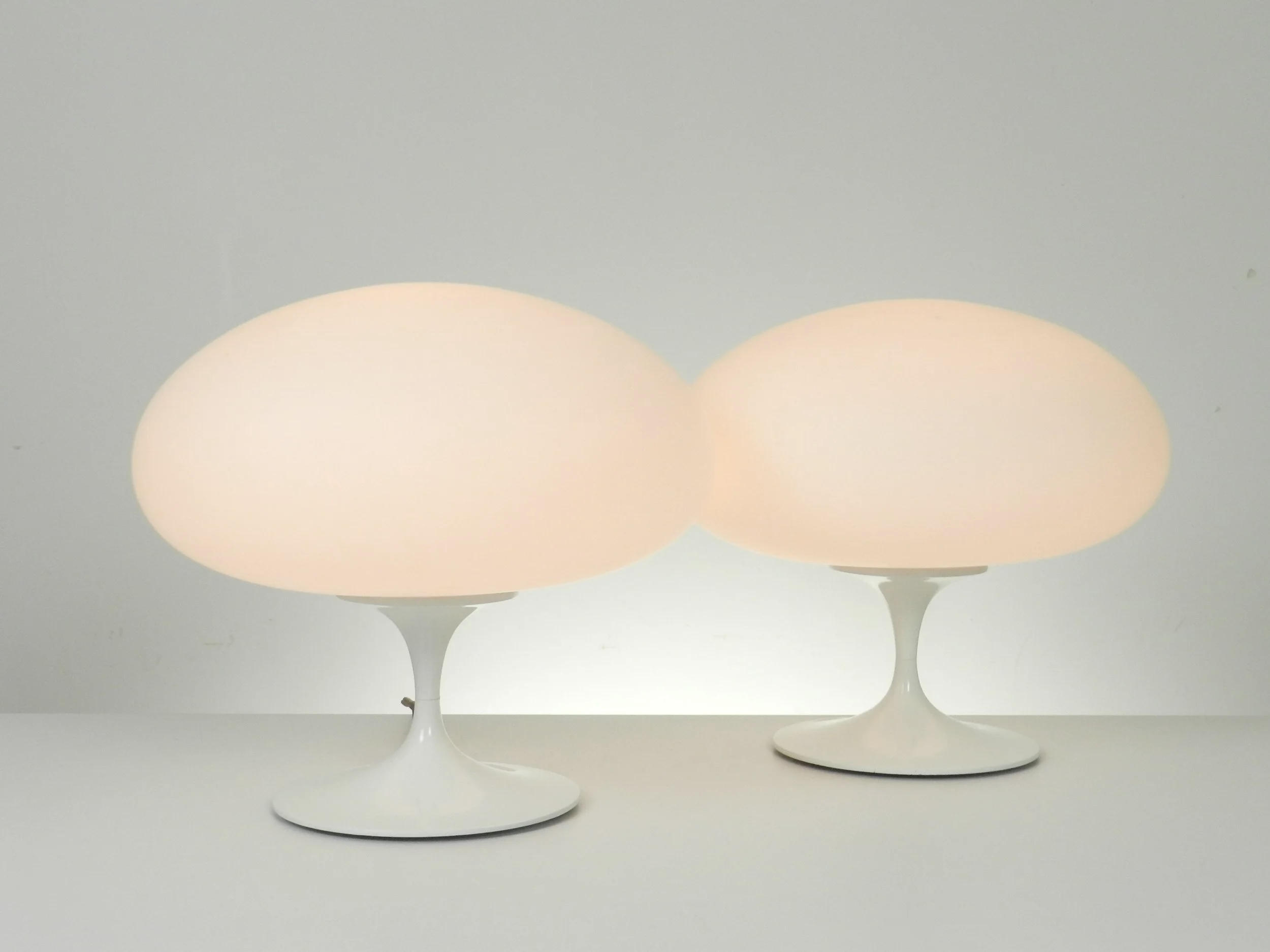 Pair of vintage mushroom lamp in cast metal with opaline glass shades by Laurel Lamp Co.  USA, 1960s.