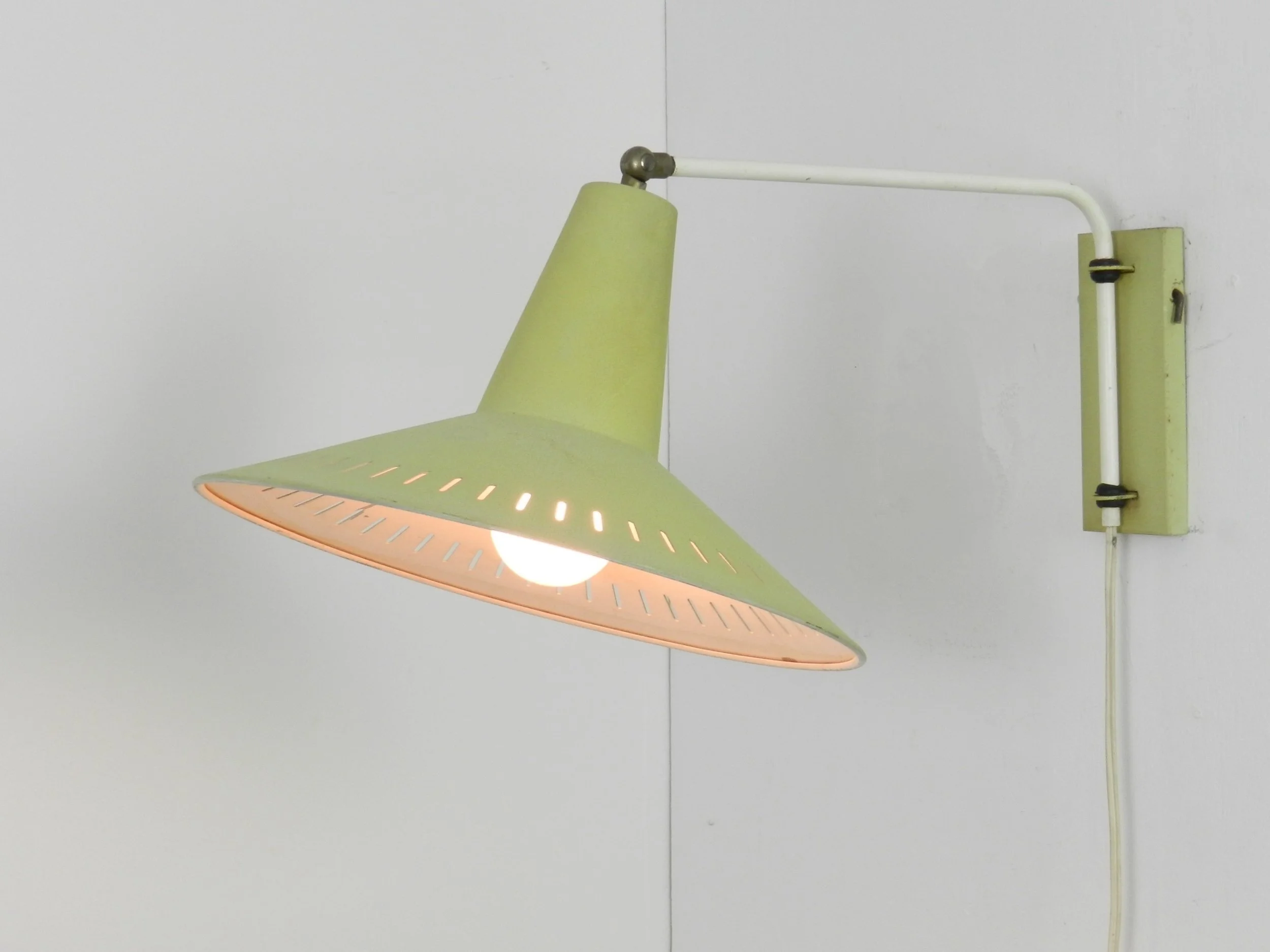 Mid century modern wall lamp attributed to Anvia.  Netherlands, 1950s.