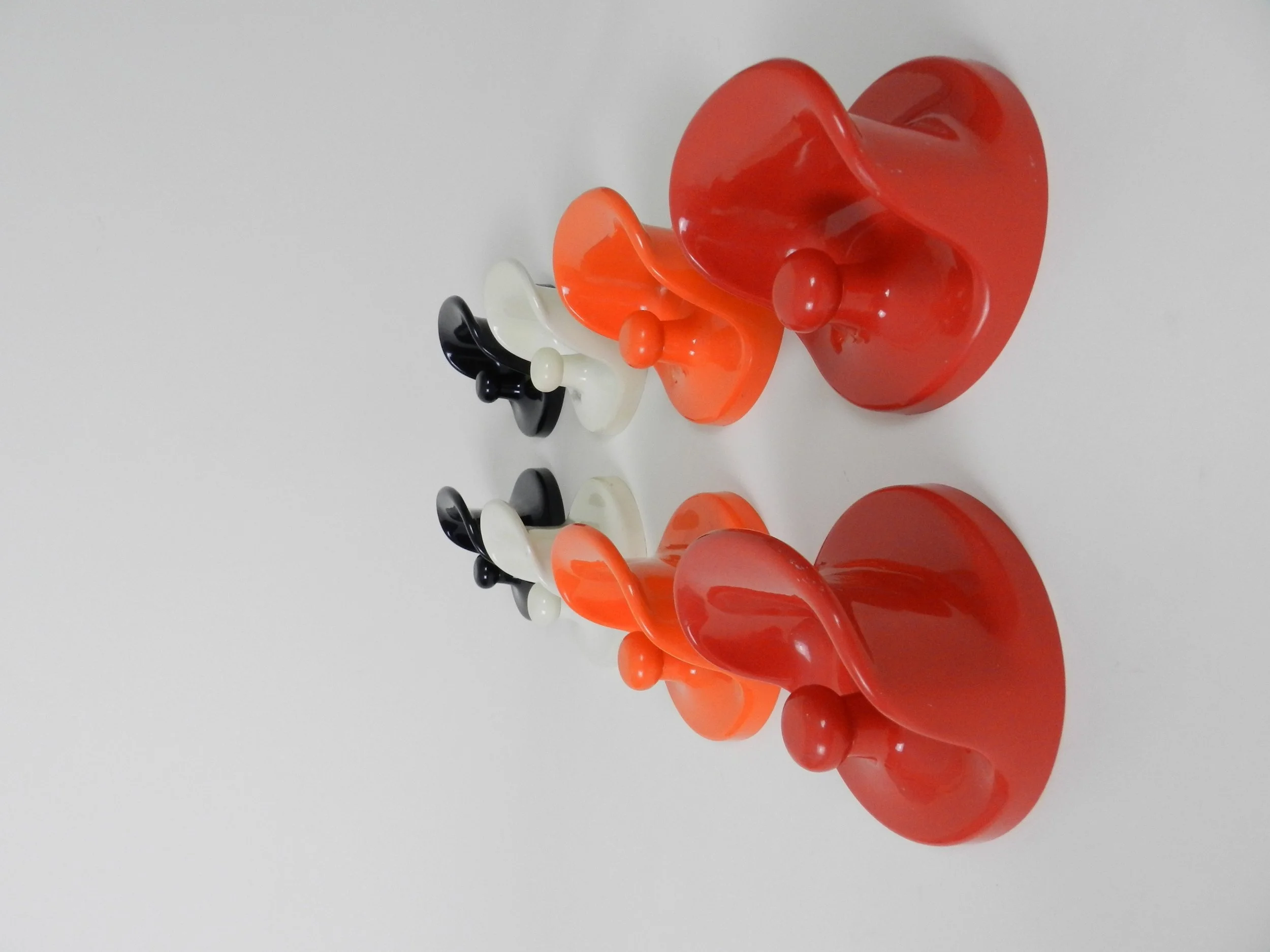 Vintage set of plastic wall mounted coat hooks designed by Olaf Von Bohr for Kartell.  Italy, 1970s.