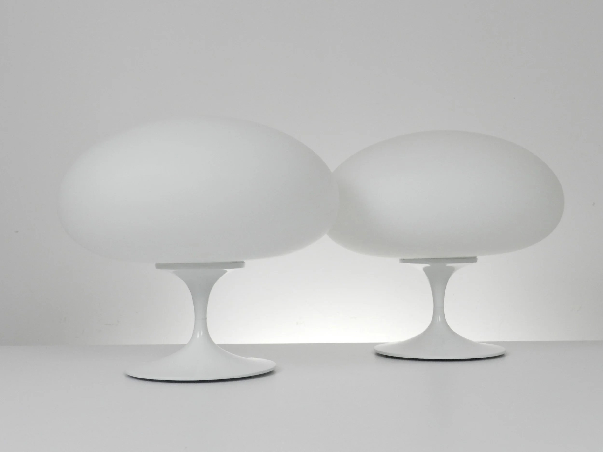 Pair of vintage mushroom lamp in cast metal with opaline glass shades by Laurel Lamp Co.  USA, 1960s.