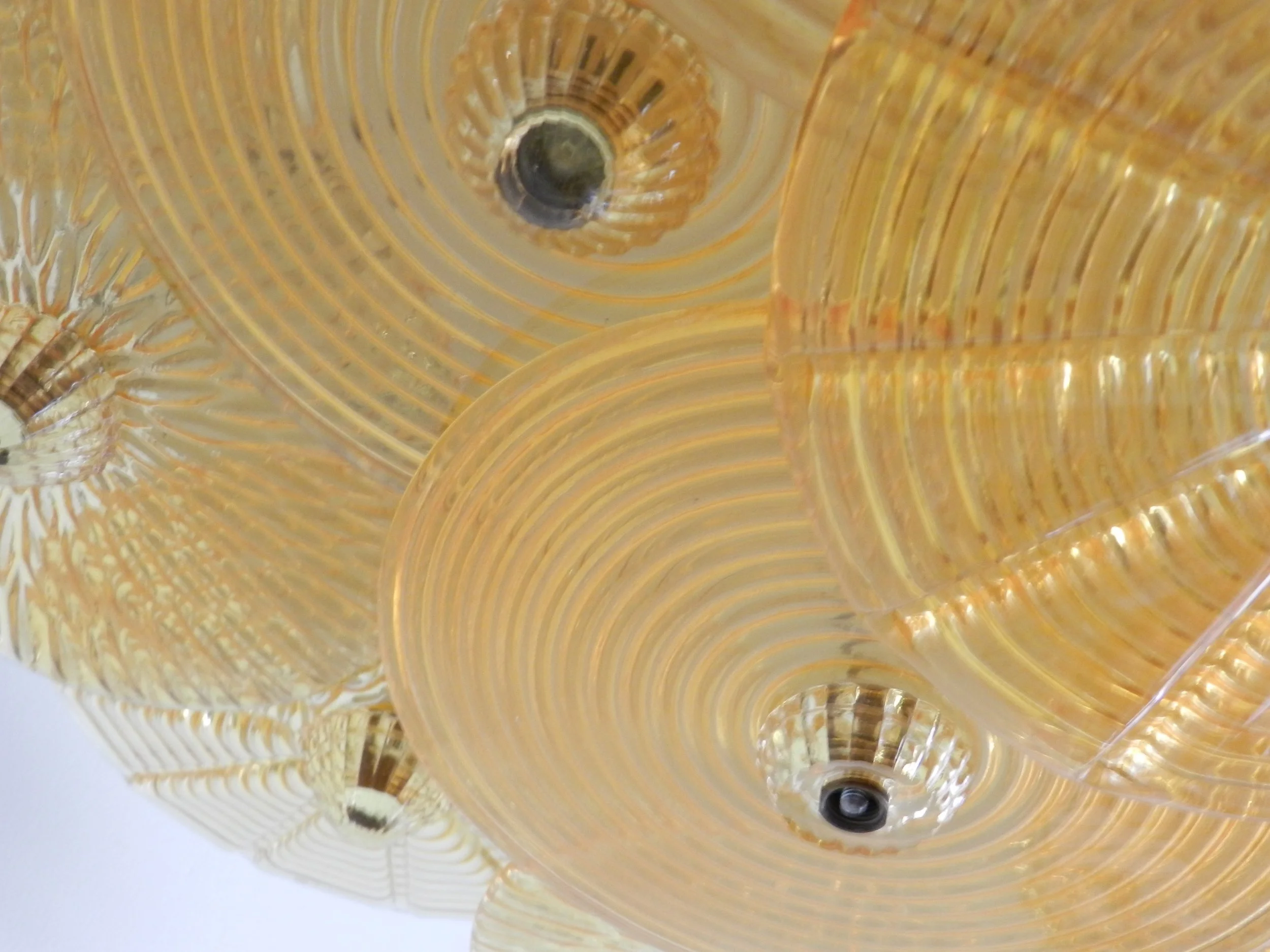 Large murano amber glass disc chandlier from Italy.