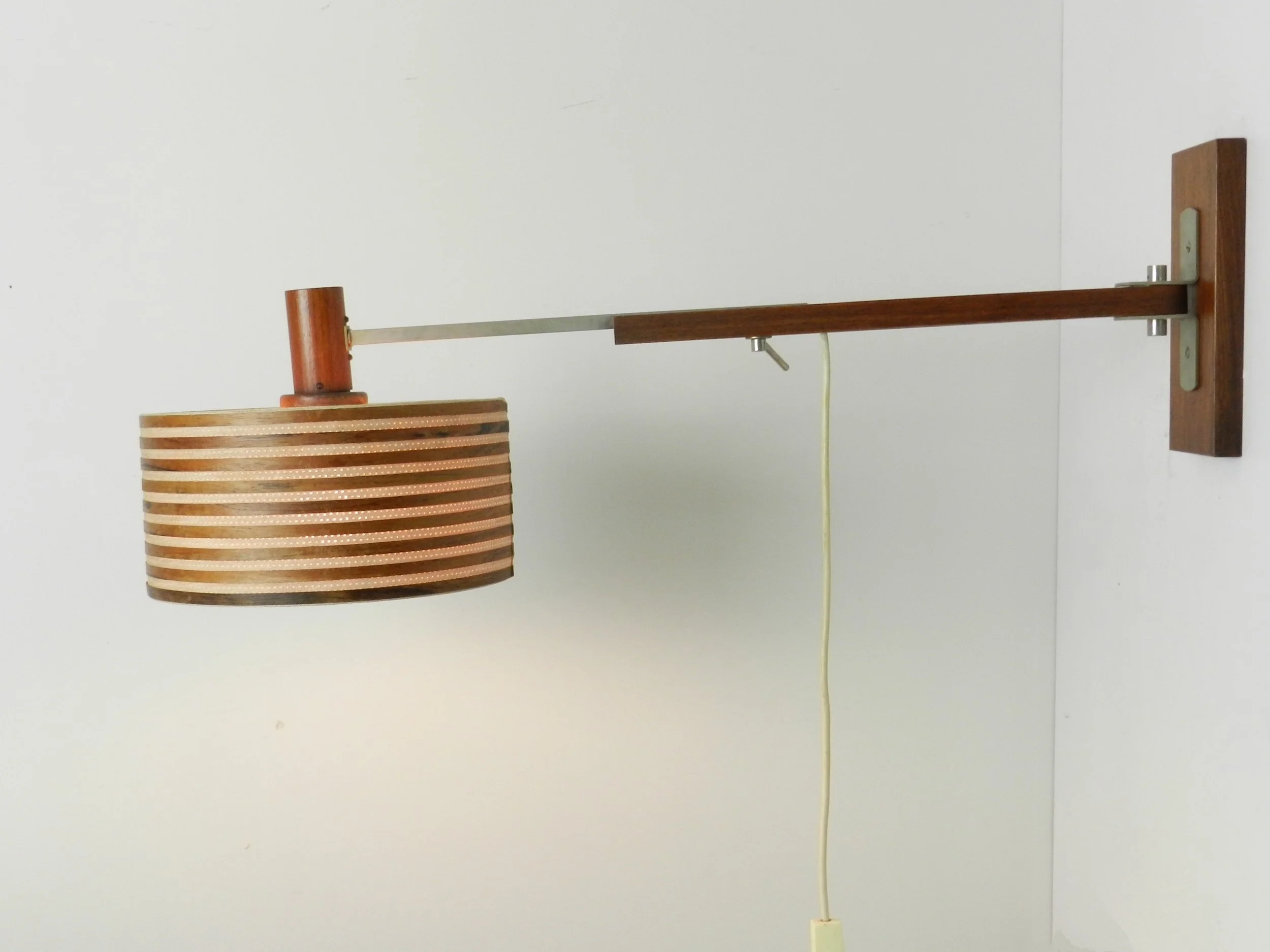 Mid century extendable wall lamp in rosewood and chrome with original shade.  Denmark, 1960s.