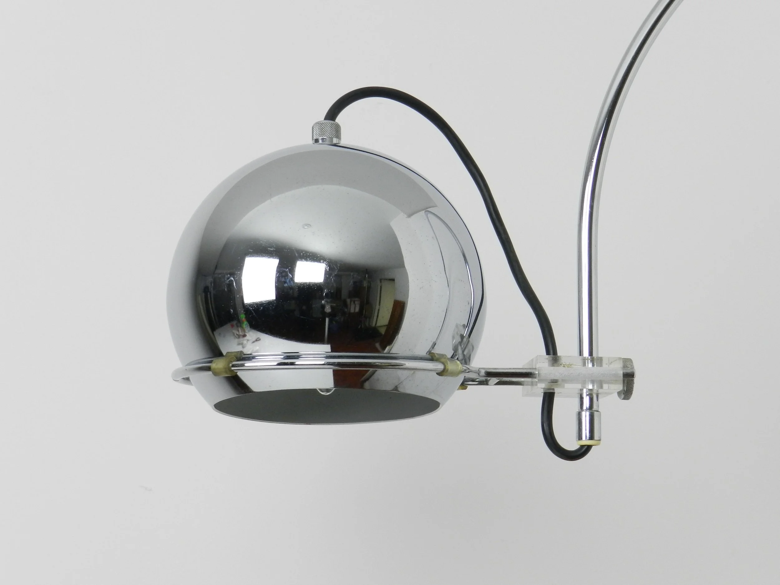 Chrome space age arc wall lamp by Gepo.  Netherlands, 1970s.