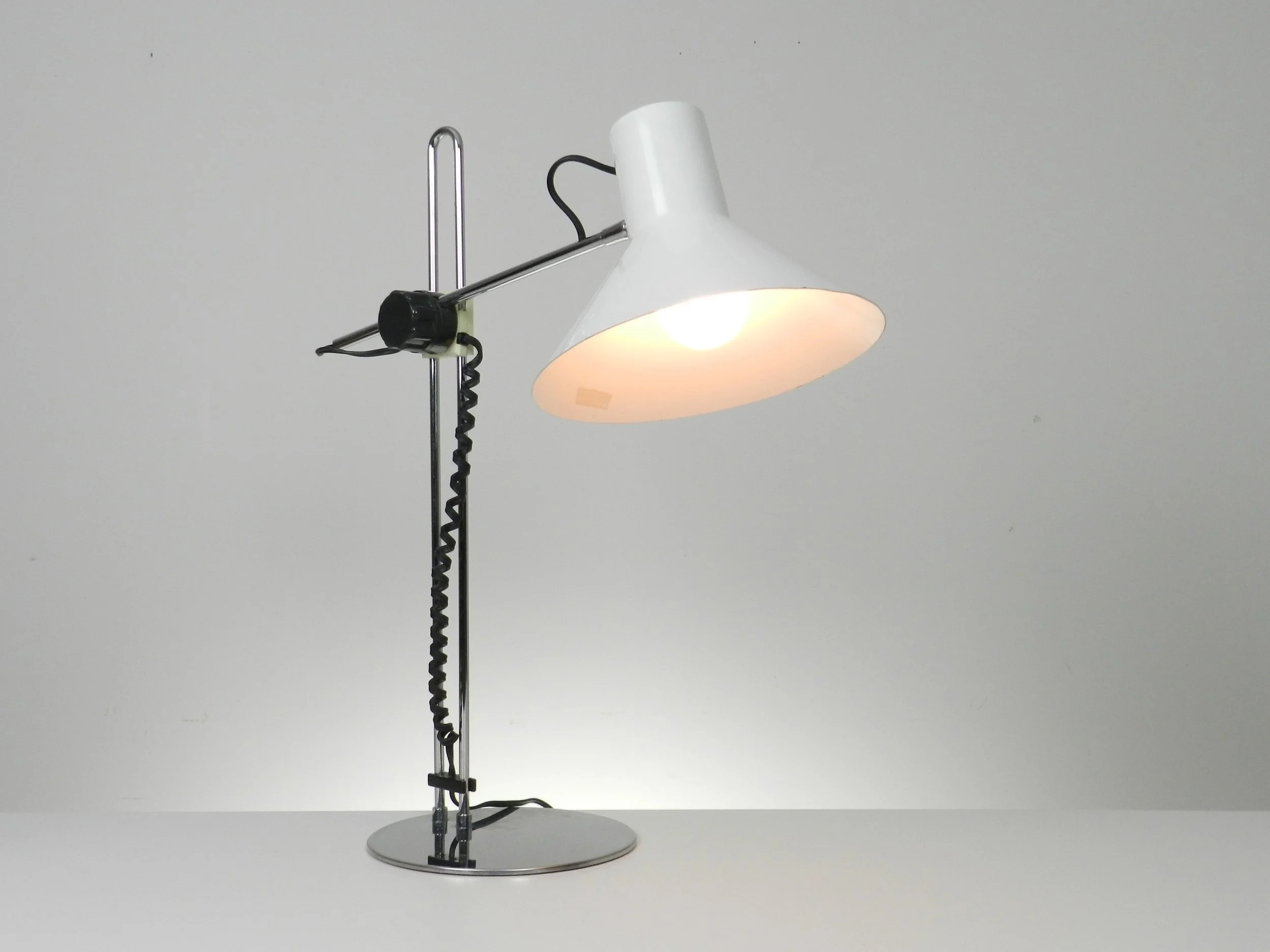 Modernist desk lamp in chrome, plastic and enameled metal by Nanbu.  Japan, 1970s.