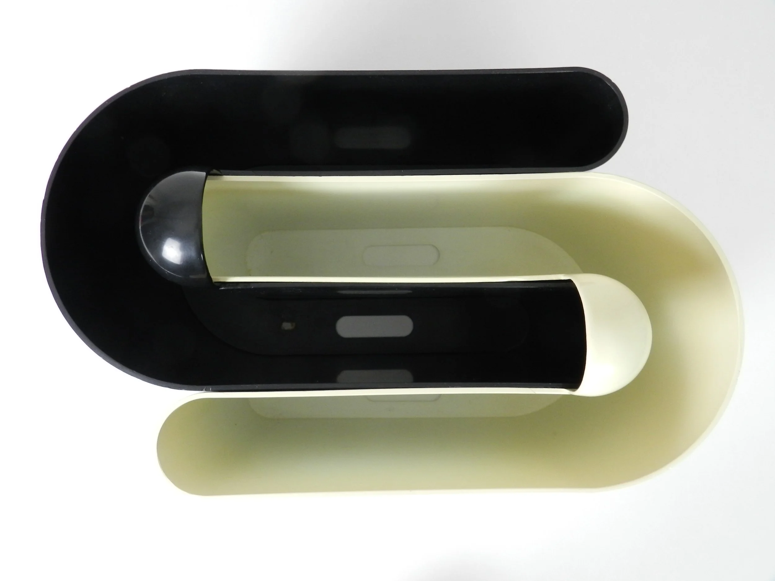 Pair of nesting plastic magazine racks designed by Rodolfo Bonetto for Vastill.  Italian design, manufactured in Canada, 1960s.