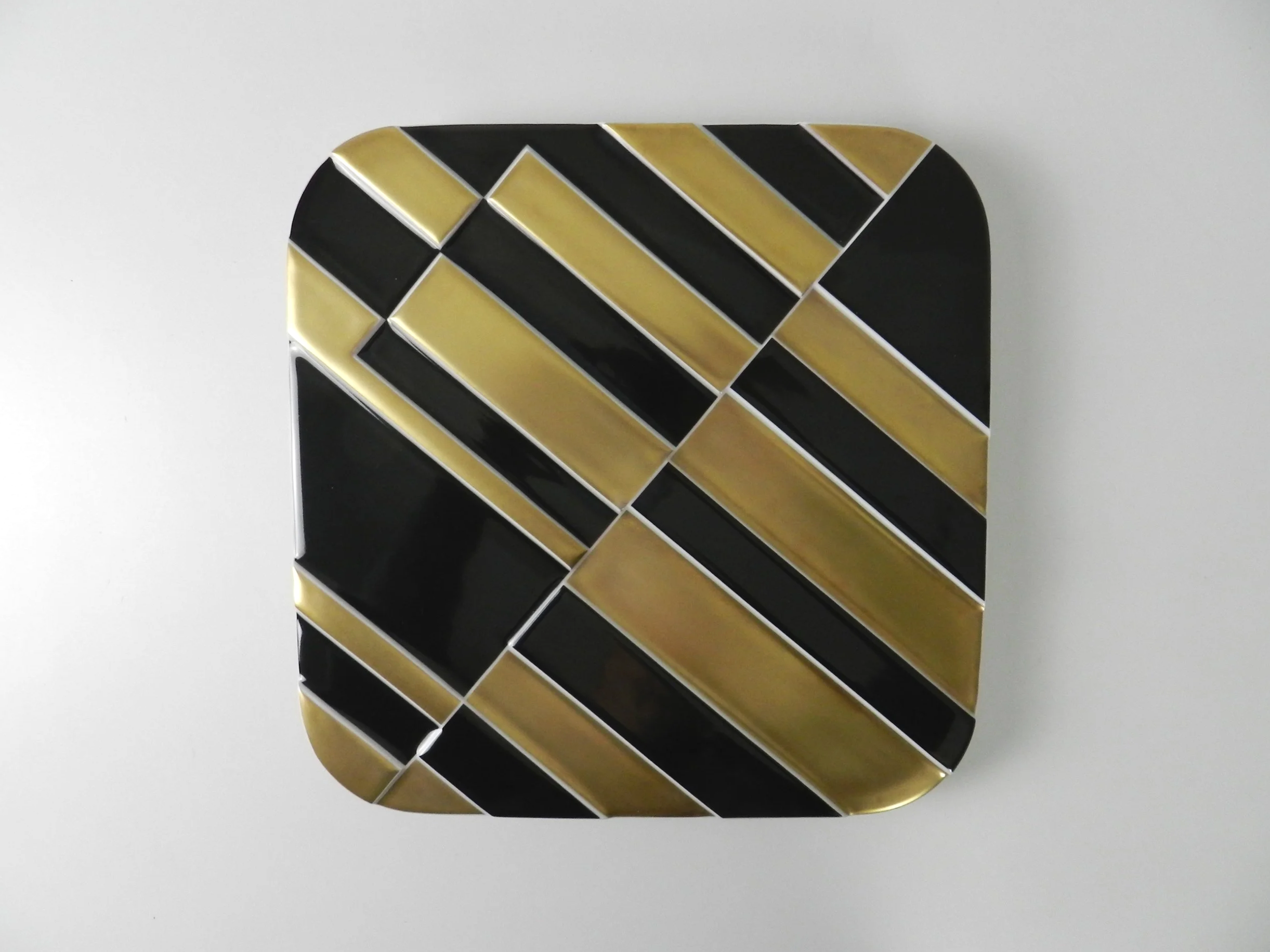 Porcelain wall plaque / plate designed by Gunter Fruhtrunk for Rosenthal. Limited edition 128/3000.  Germany, 1974.