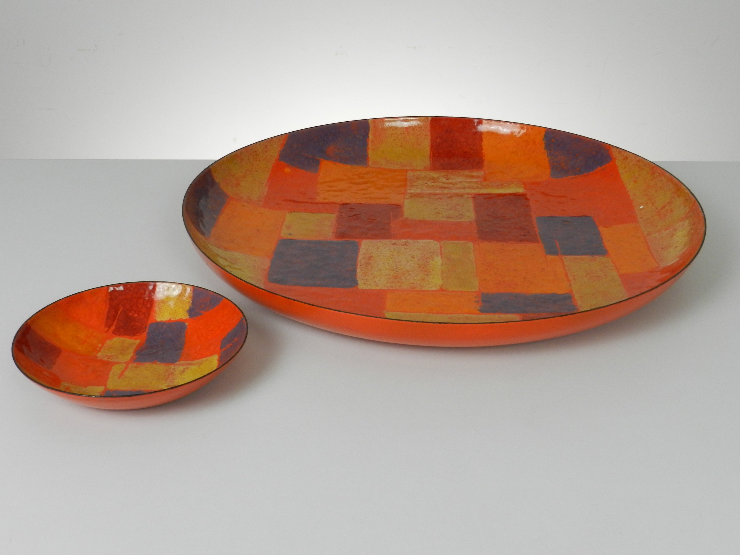 Extra large patchwork  modernist enamel bowl with smaller matching bowl. Designer unknown, probably of Italian origin.  Italy, 1970s.