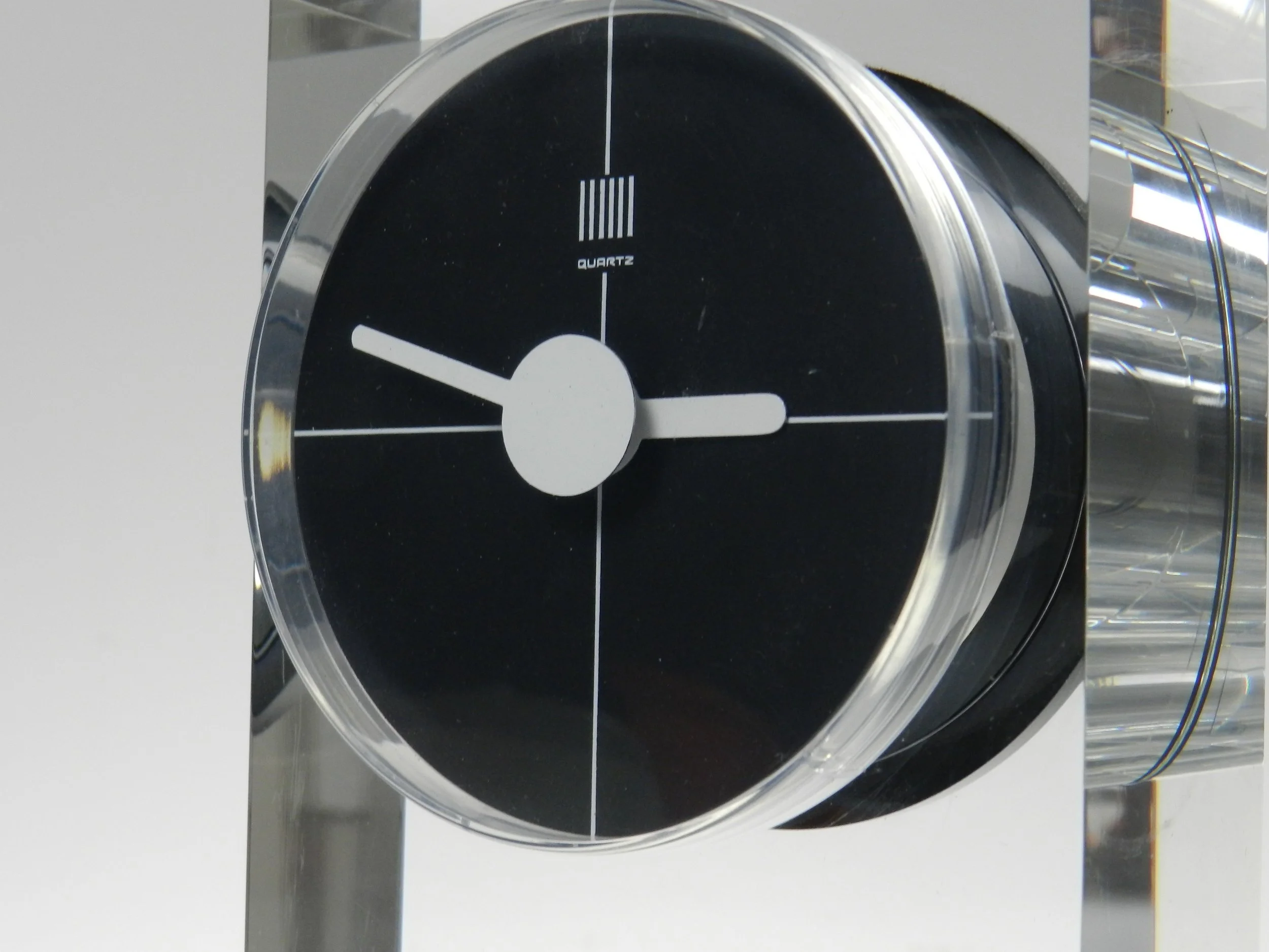 Modernist lucite clock designed by Felice Antonio Botta.  Italy, 1980s.