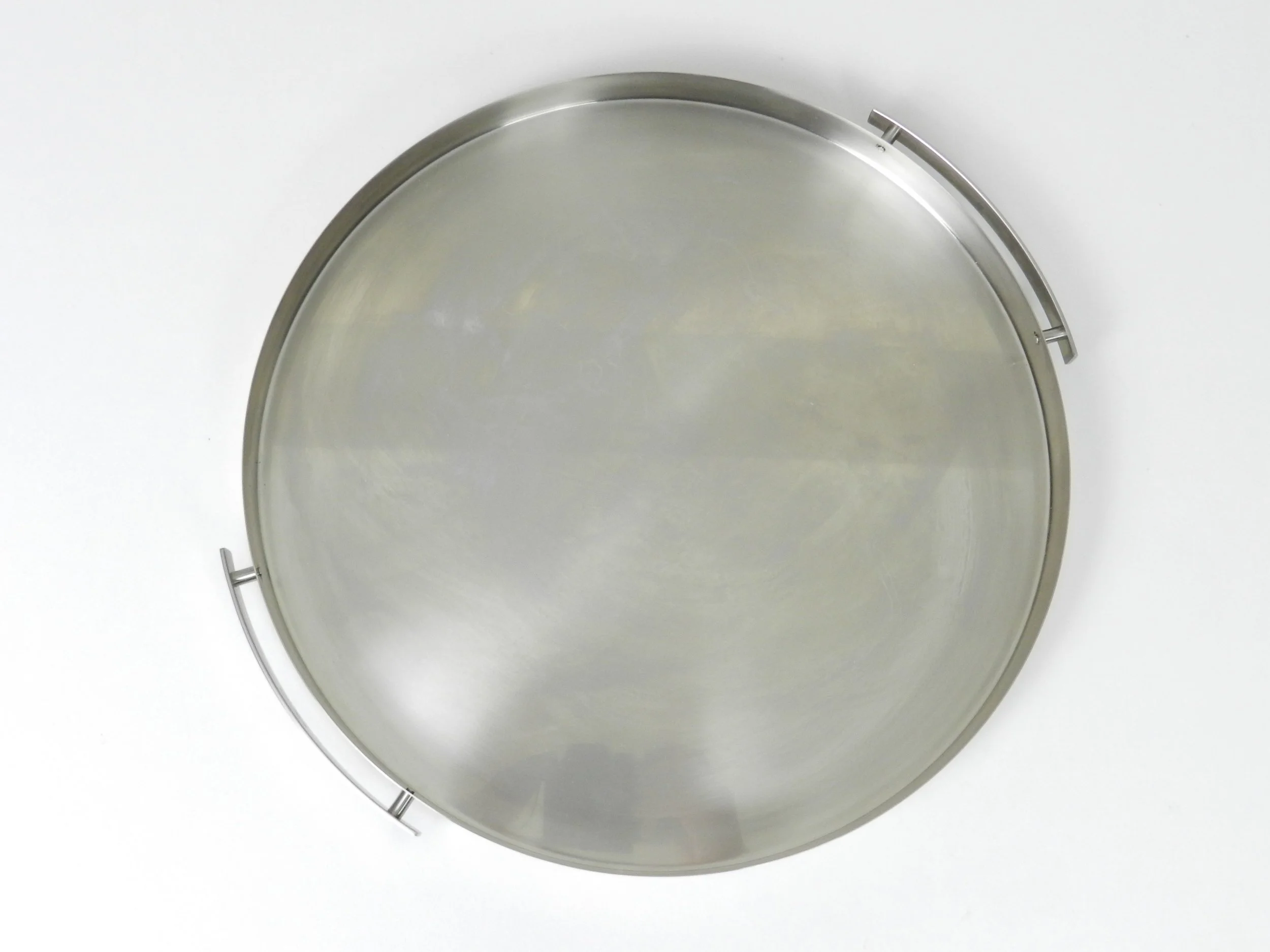 Stainless steel tray designed by Arne Jacobsen for Stelton.  Denmark, 1960s.