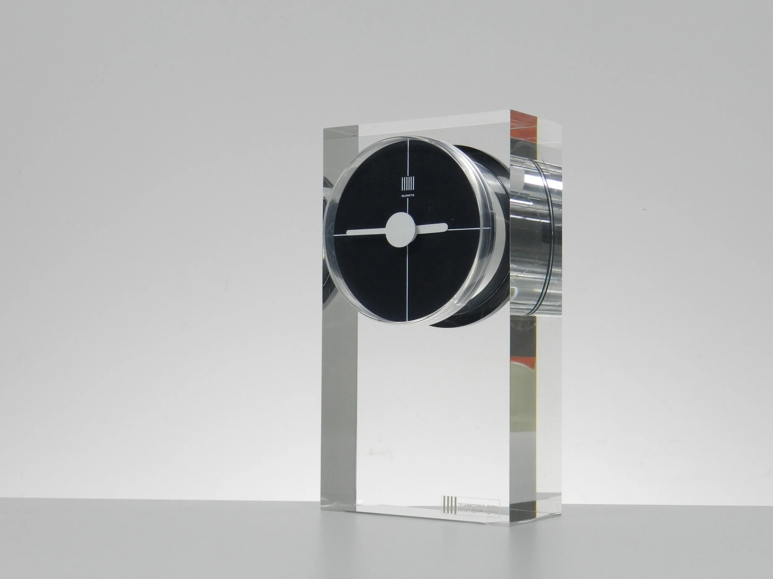 Modernist lucite clock designed by Felice Antonio Botta.  Italy, 1980s.